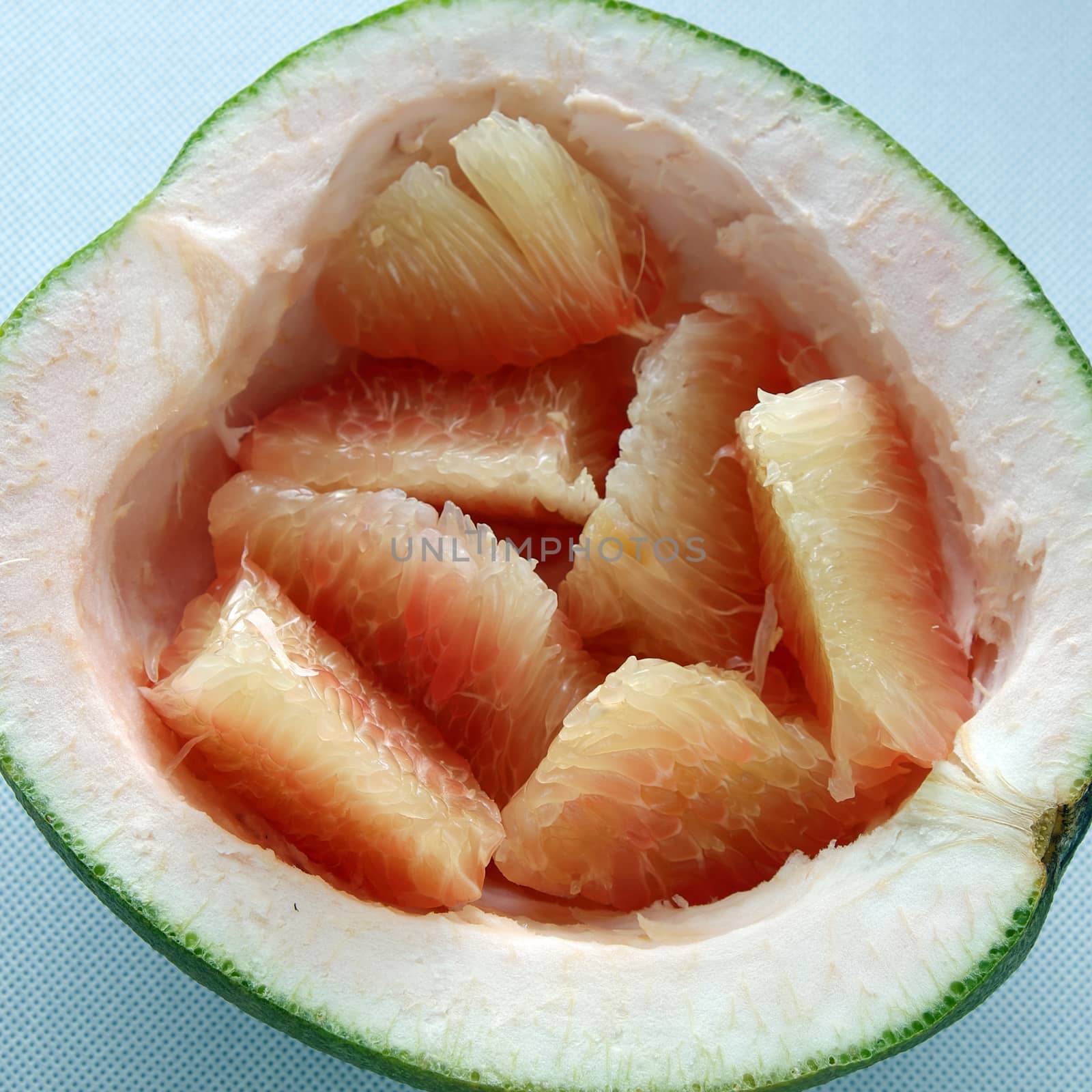 Grapefruit on white background, tropical fruit by xuanhuongho