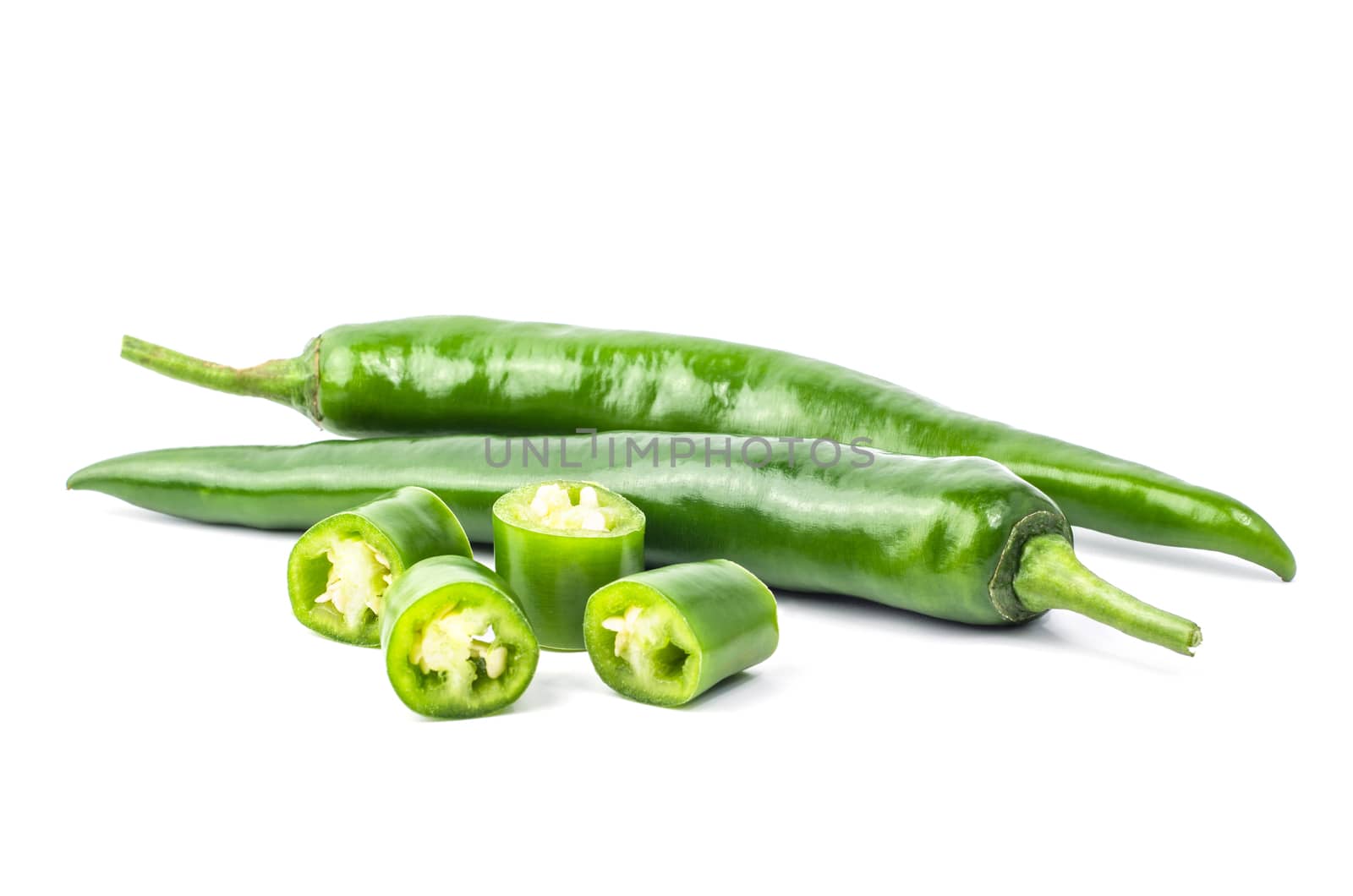 Green chilli pepper on white background. by koson