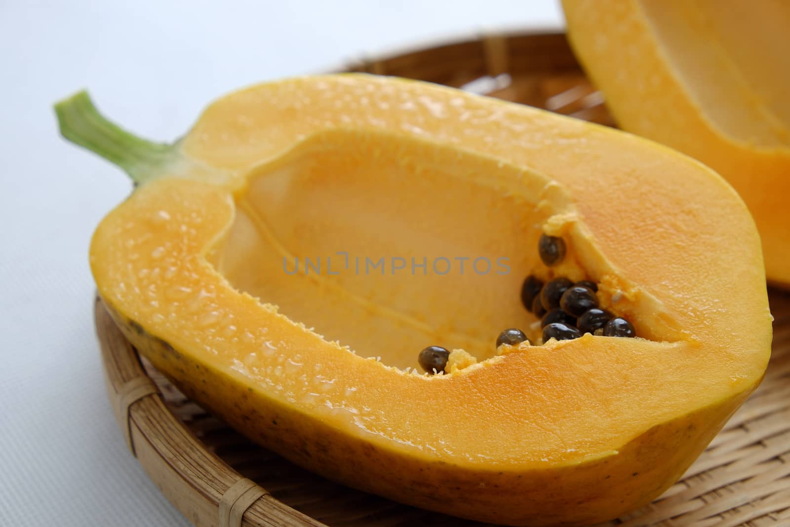Papaya on white background, tropical fruit, Vietnamese agriculture product, rich fiber and vitamin A,C ,E, make healthy heart, prevent atherosclerosis, laxative, good for digestive system, tonic