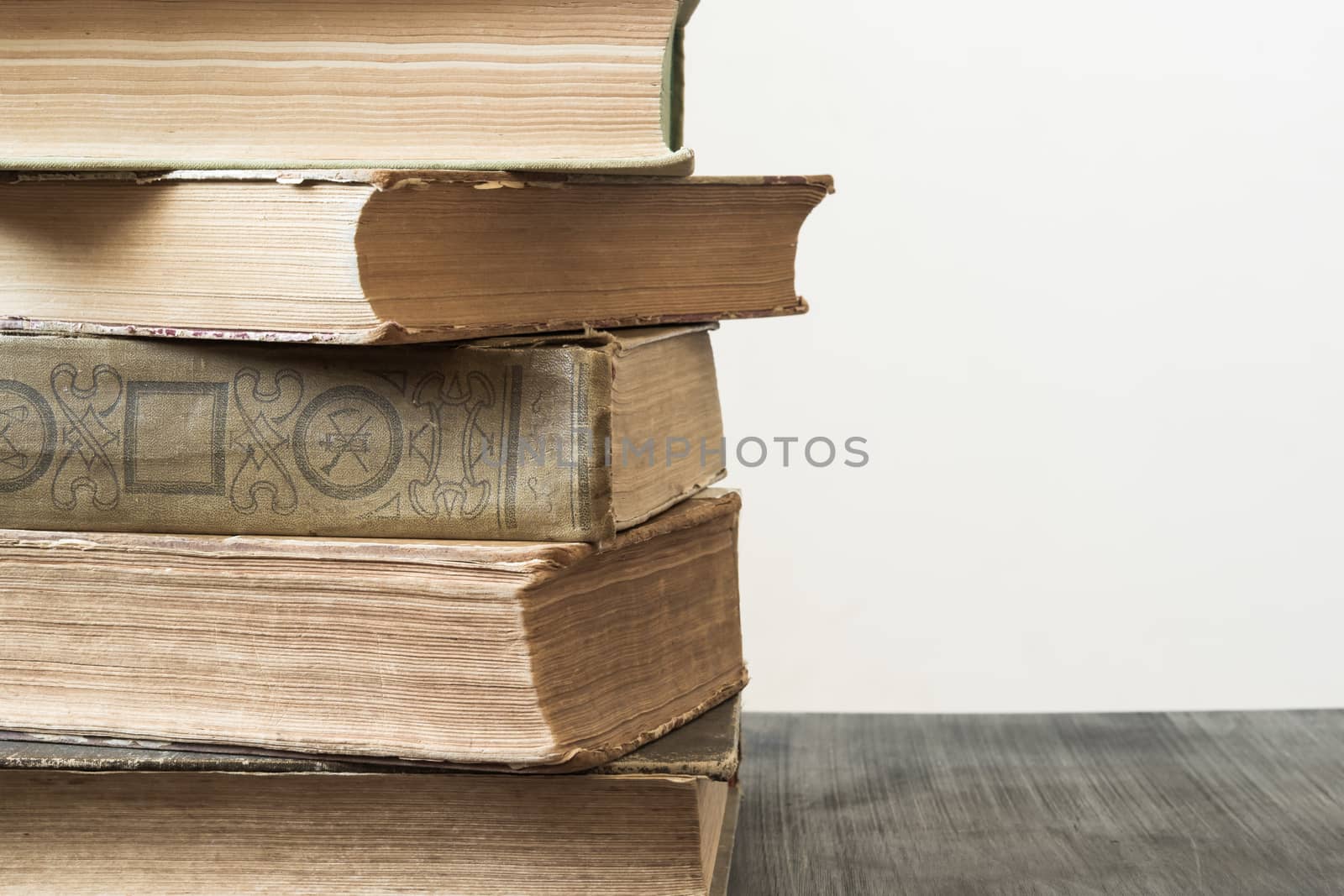 Stack of old books by photoboyko