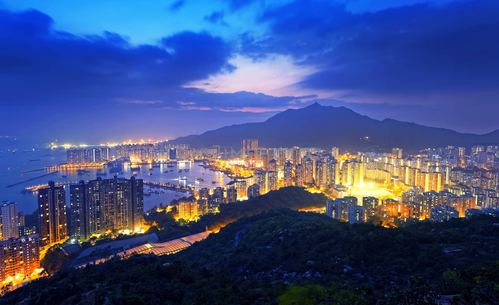 Hong Kong Tuen Mun skyline and South China sea at night