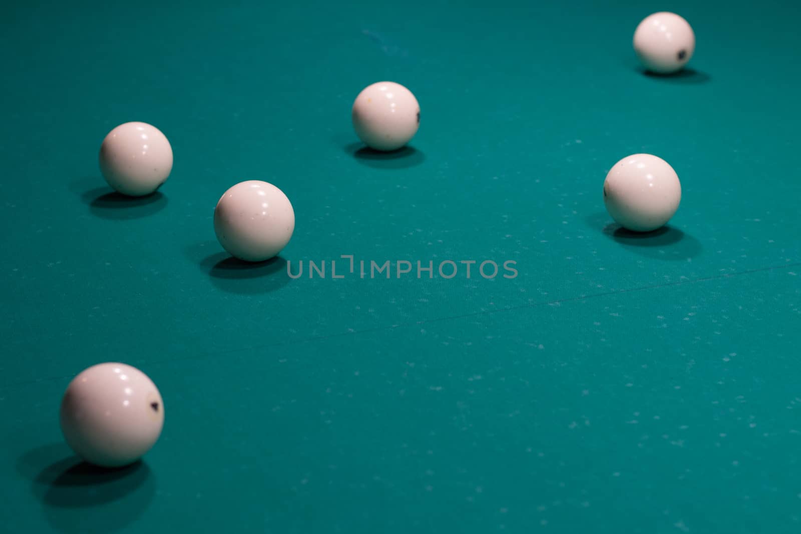Close-up of Russian billiard: ball, on green game table