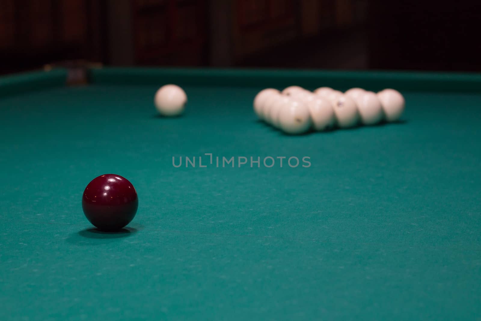 Russian billiard,  black and white balls on green table cloth