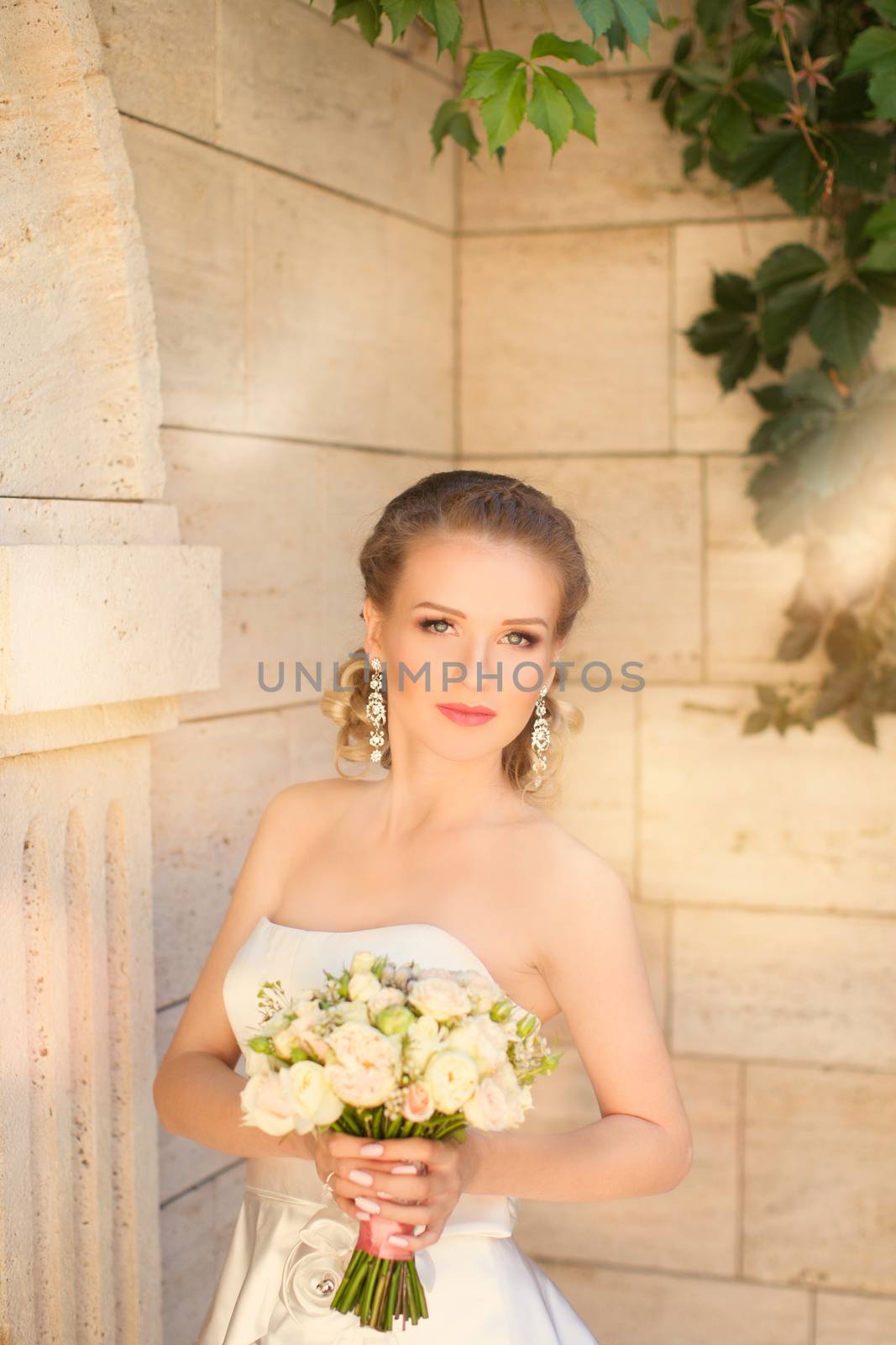 Portrait of the bride close-up on the street