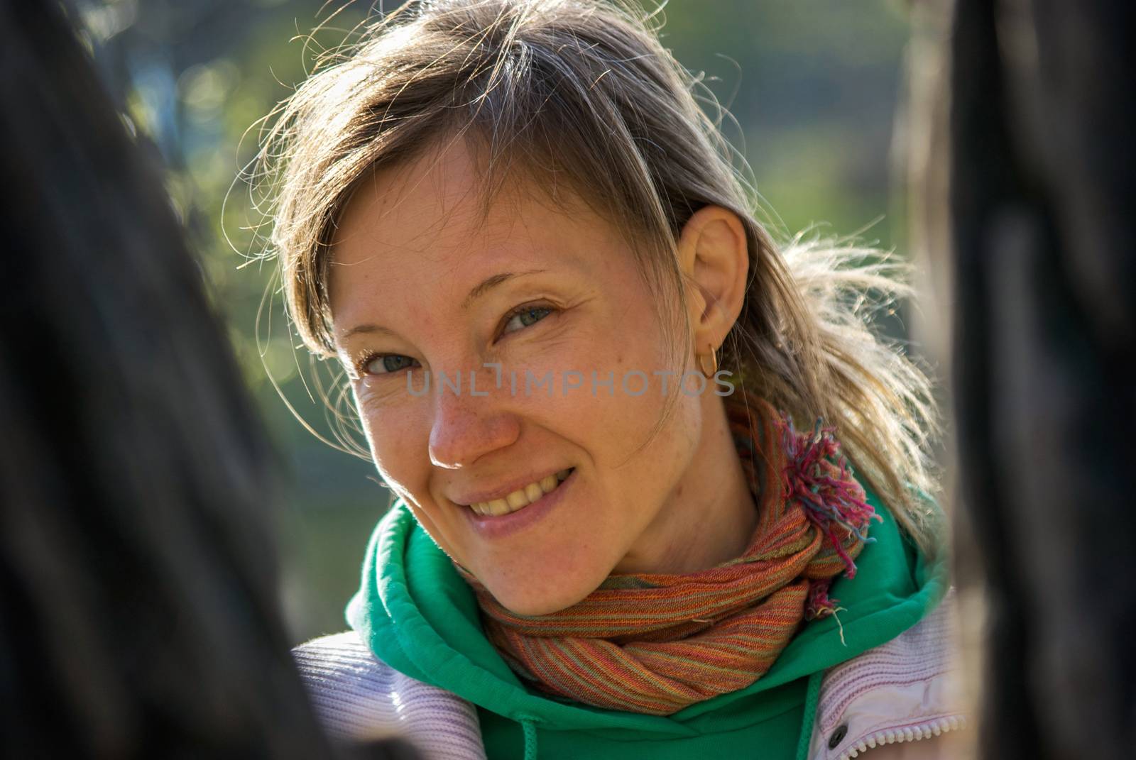 Young healthy beautiful spring woman in the forest near large tree smiling by evolutionnow