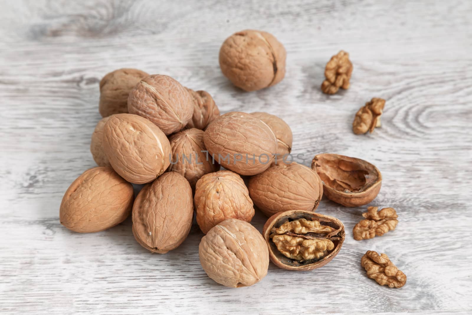 Walnuts whole in their skins, chopped, nut hulls, walnut kernels