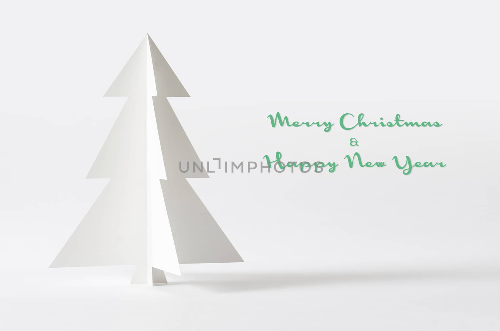 Christmas tree isolated on white background. Christmas tree paper craft.