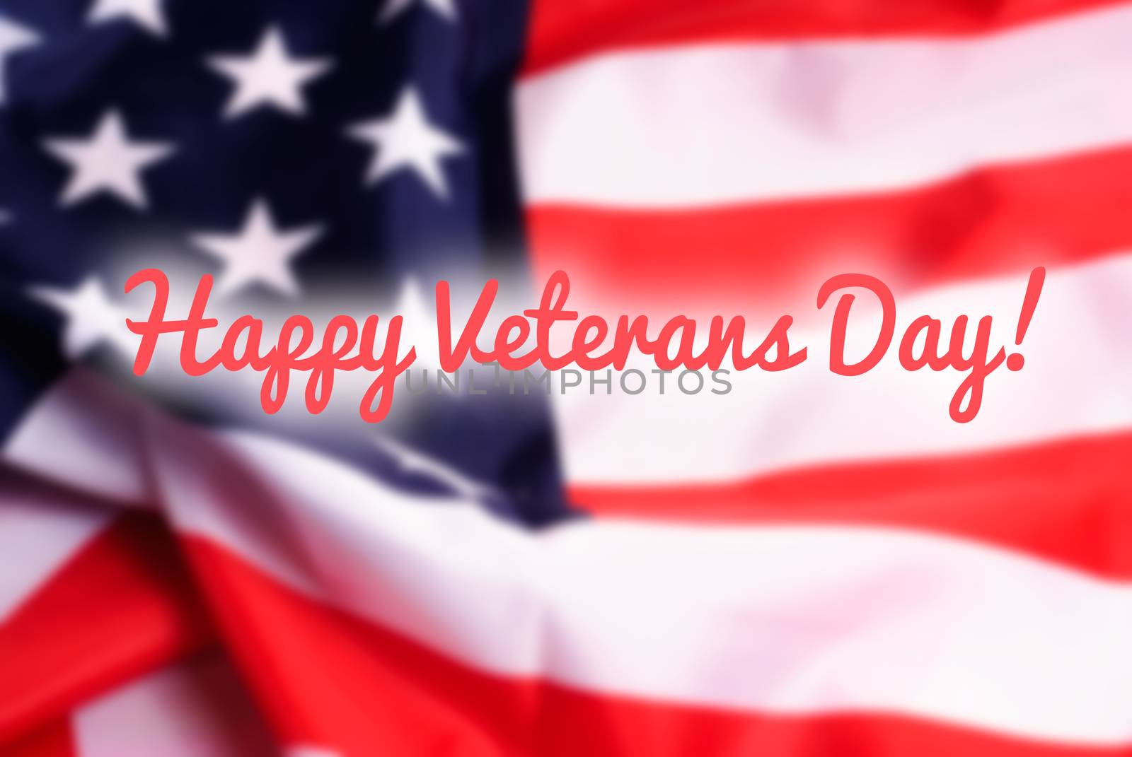 Happy Veterans Day sign on USA flag background