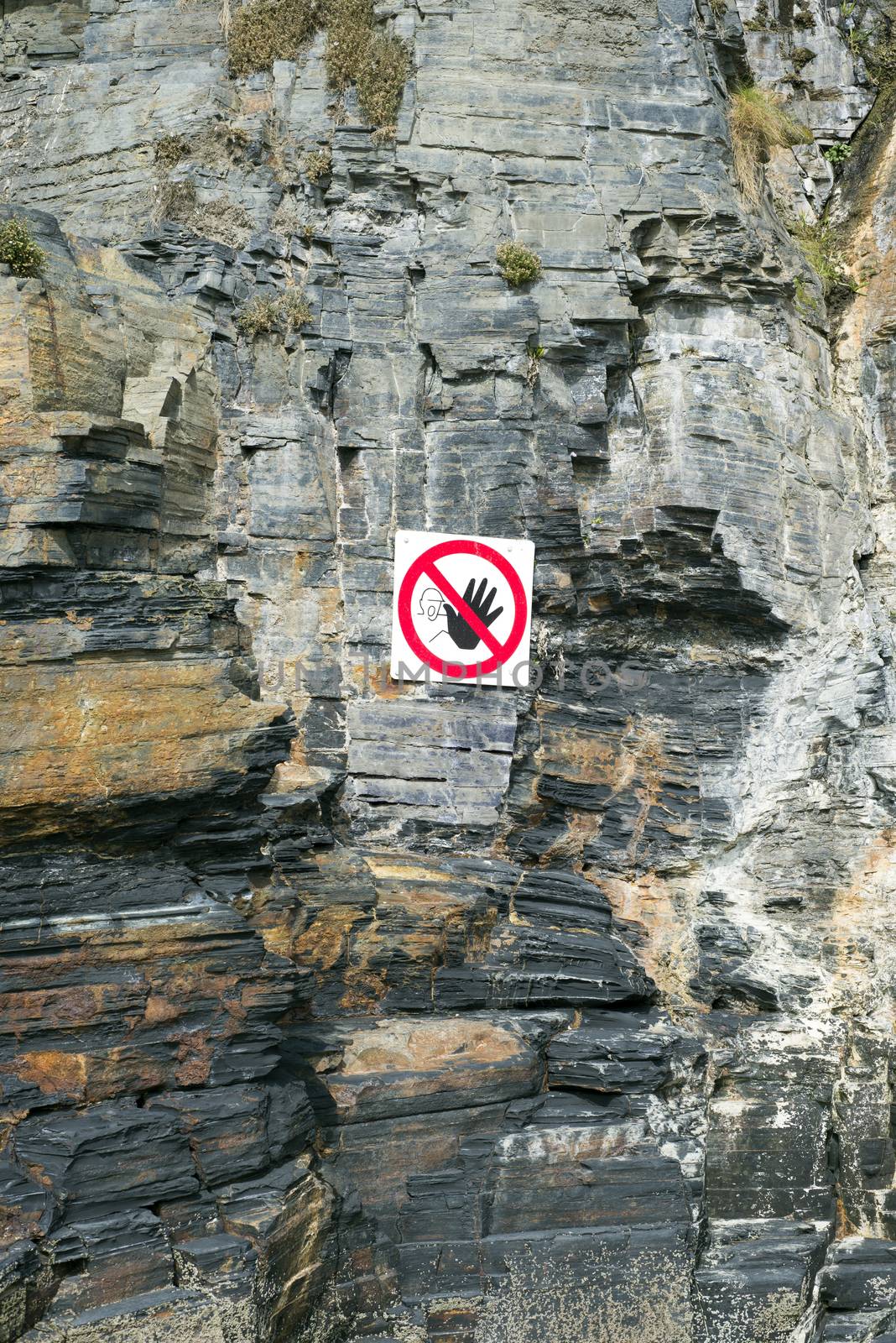 cliff face danger warning sign on the wild atlantic way