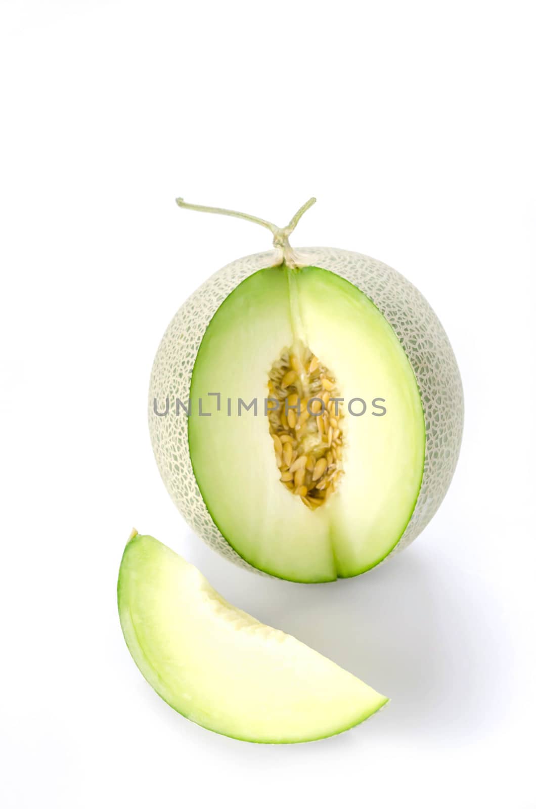 shopped green melon isolated on white background