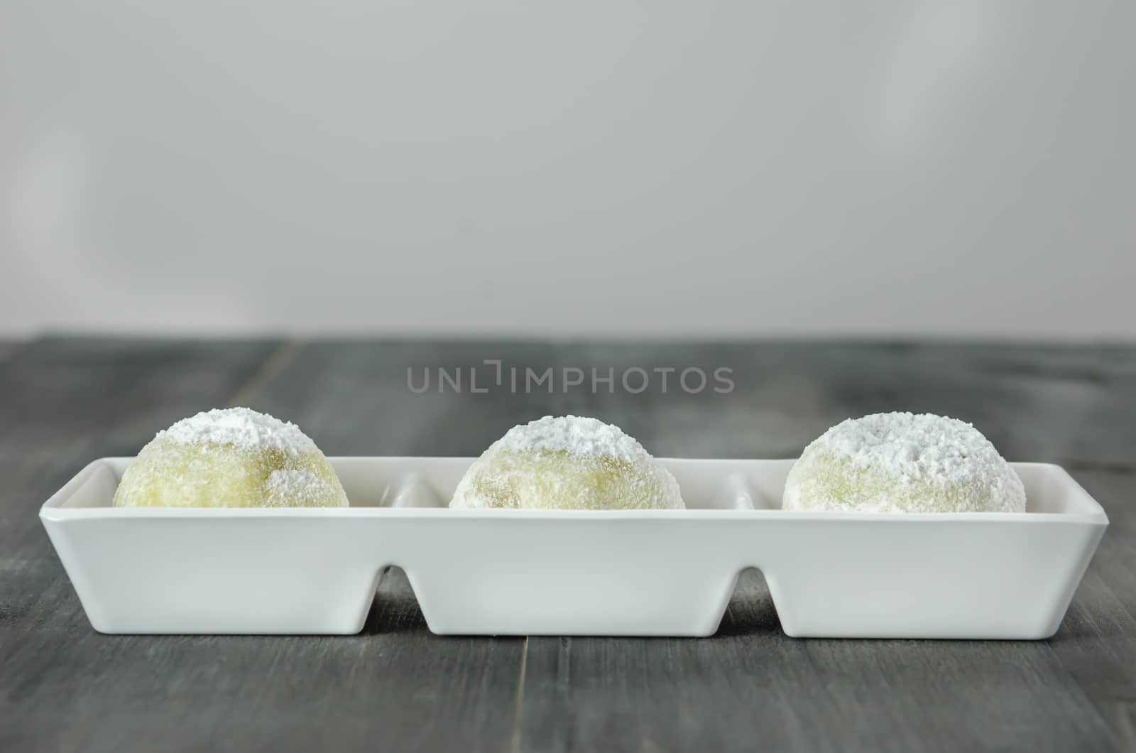 Daifuku Mochi Japanese dessert on white plate , still life