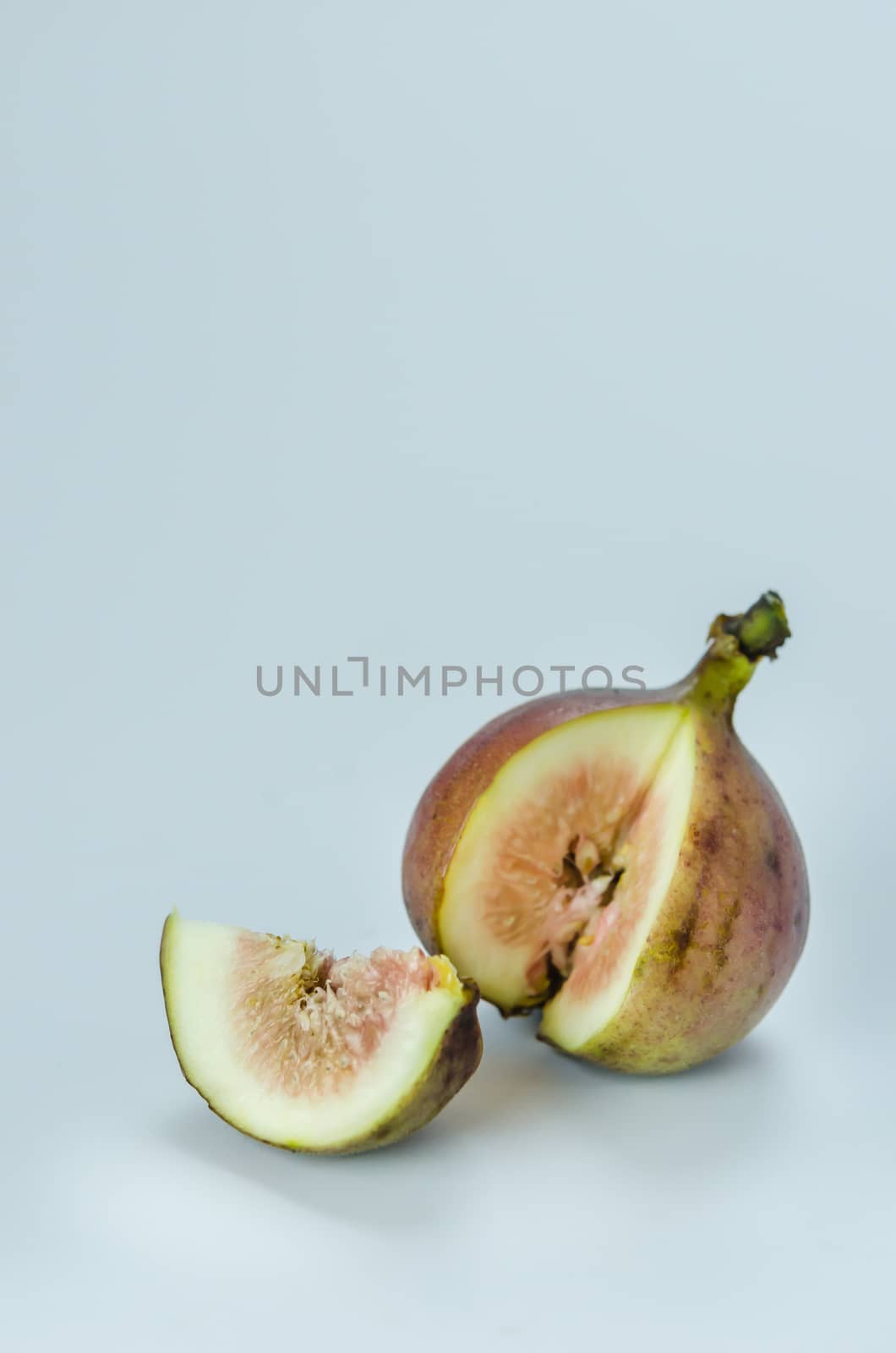 sliced fresh figs fruit on white background