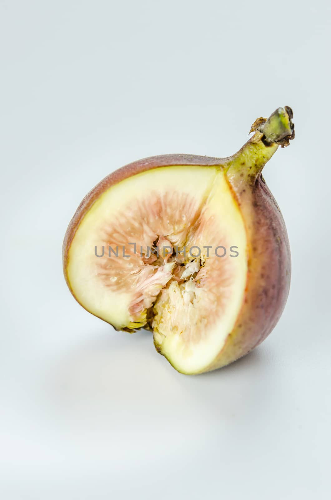 sliced fresh figs fruit on white background