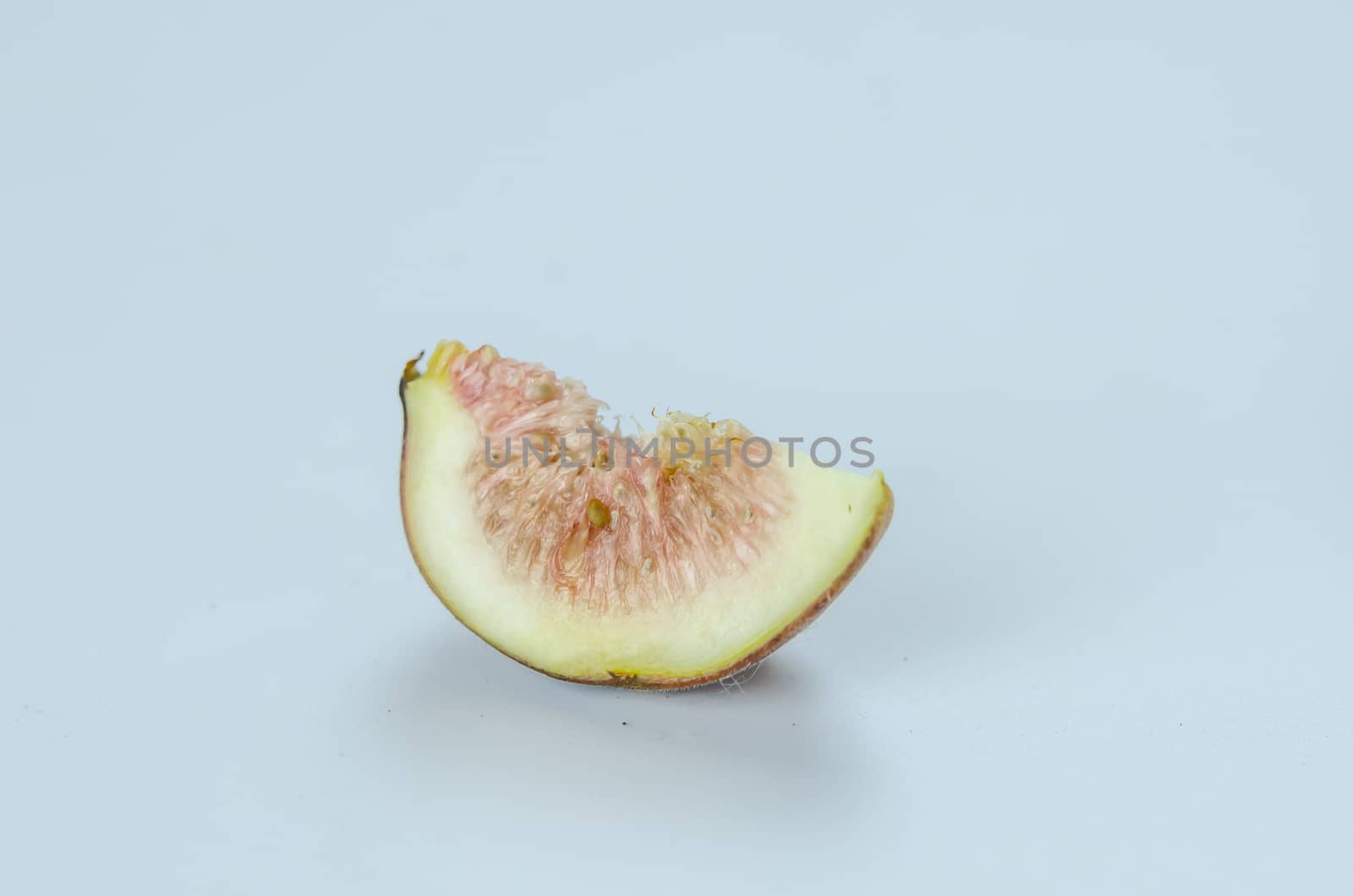 sliced fresh figs fruit on white background