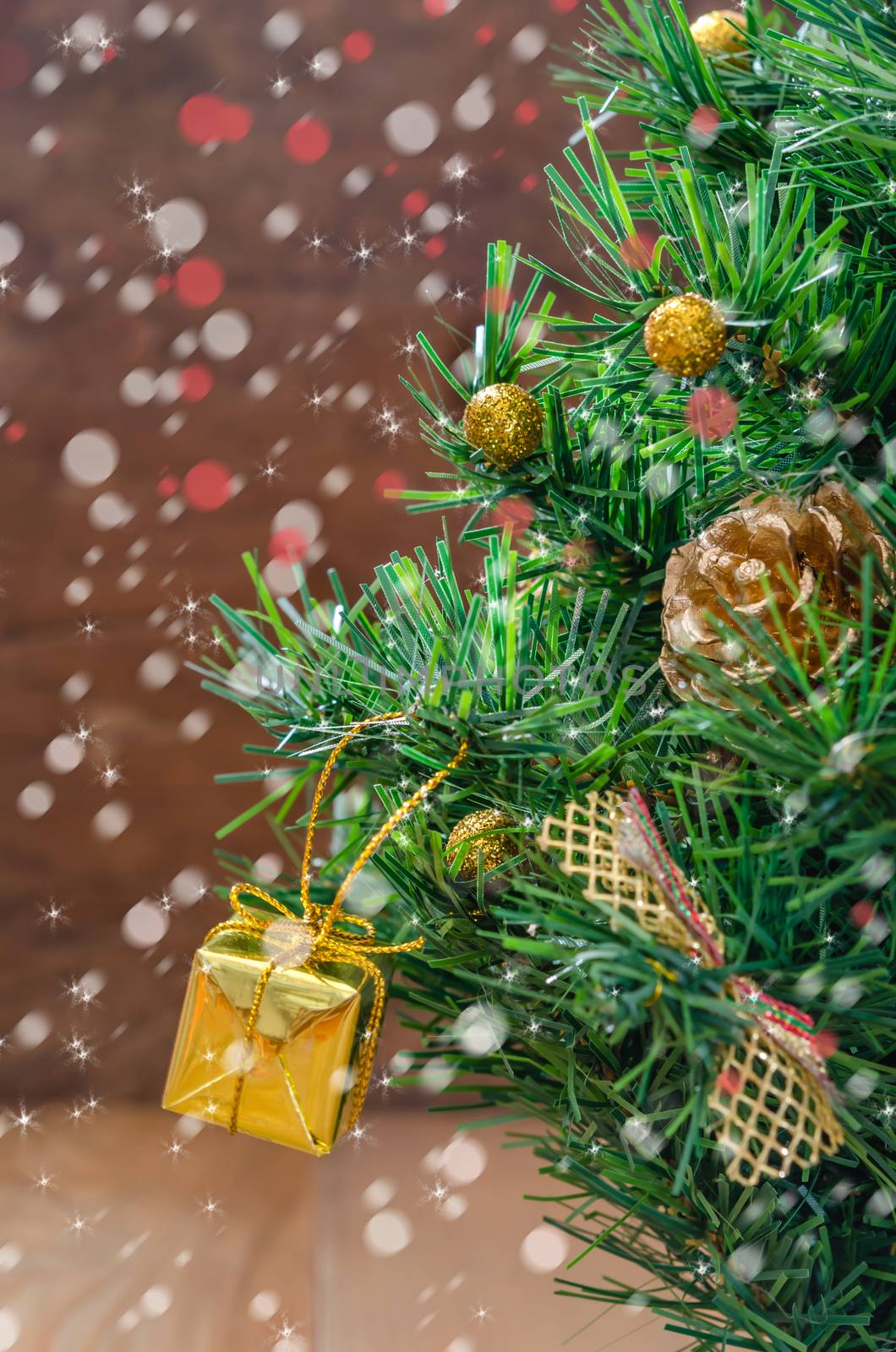 Christmas background with decorations and gift boxes on wooden board