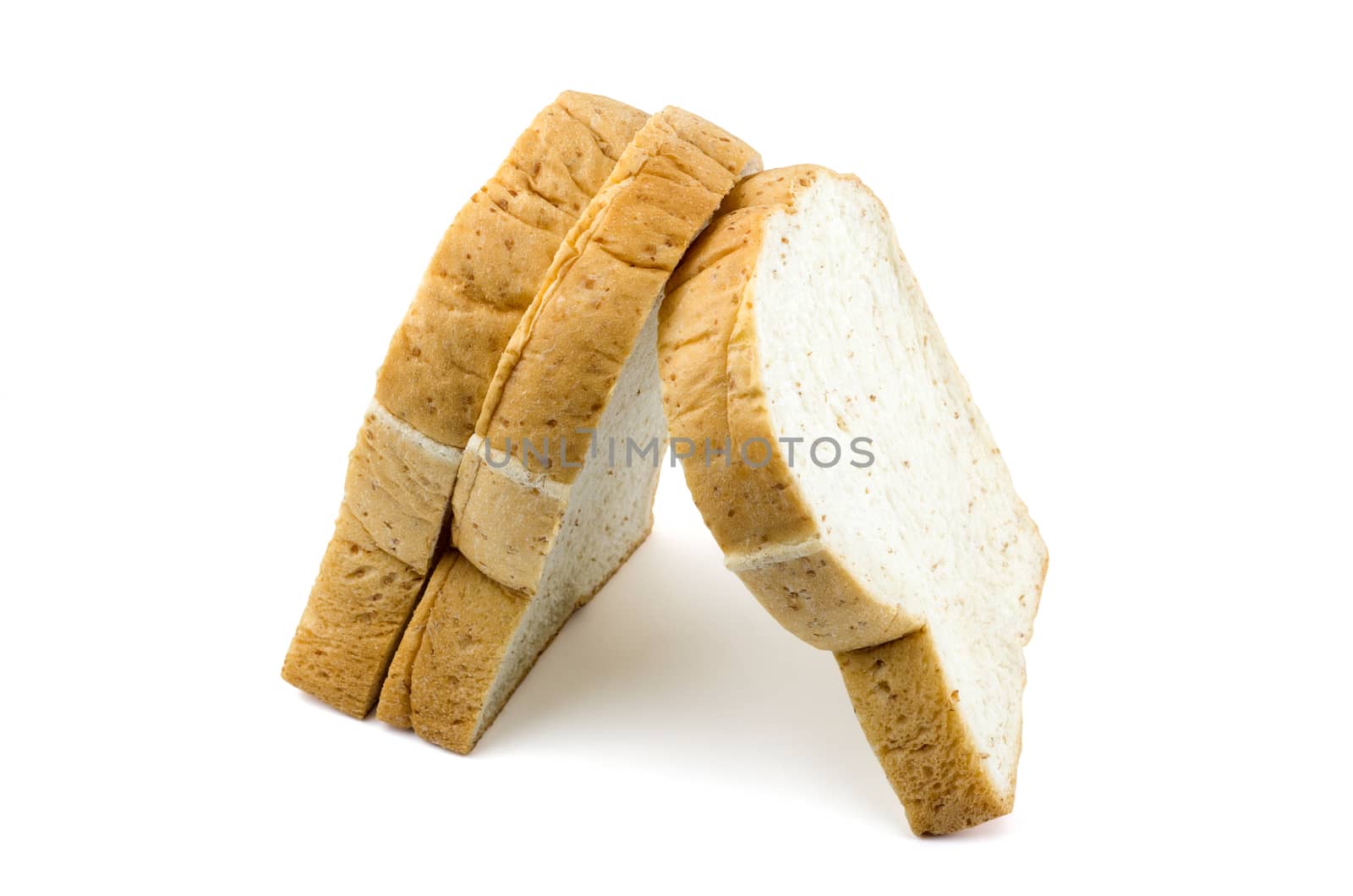 sliced whole wheat bread isolated on white background.