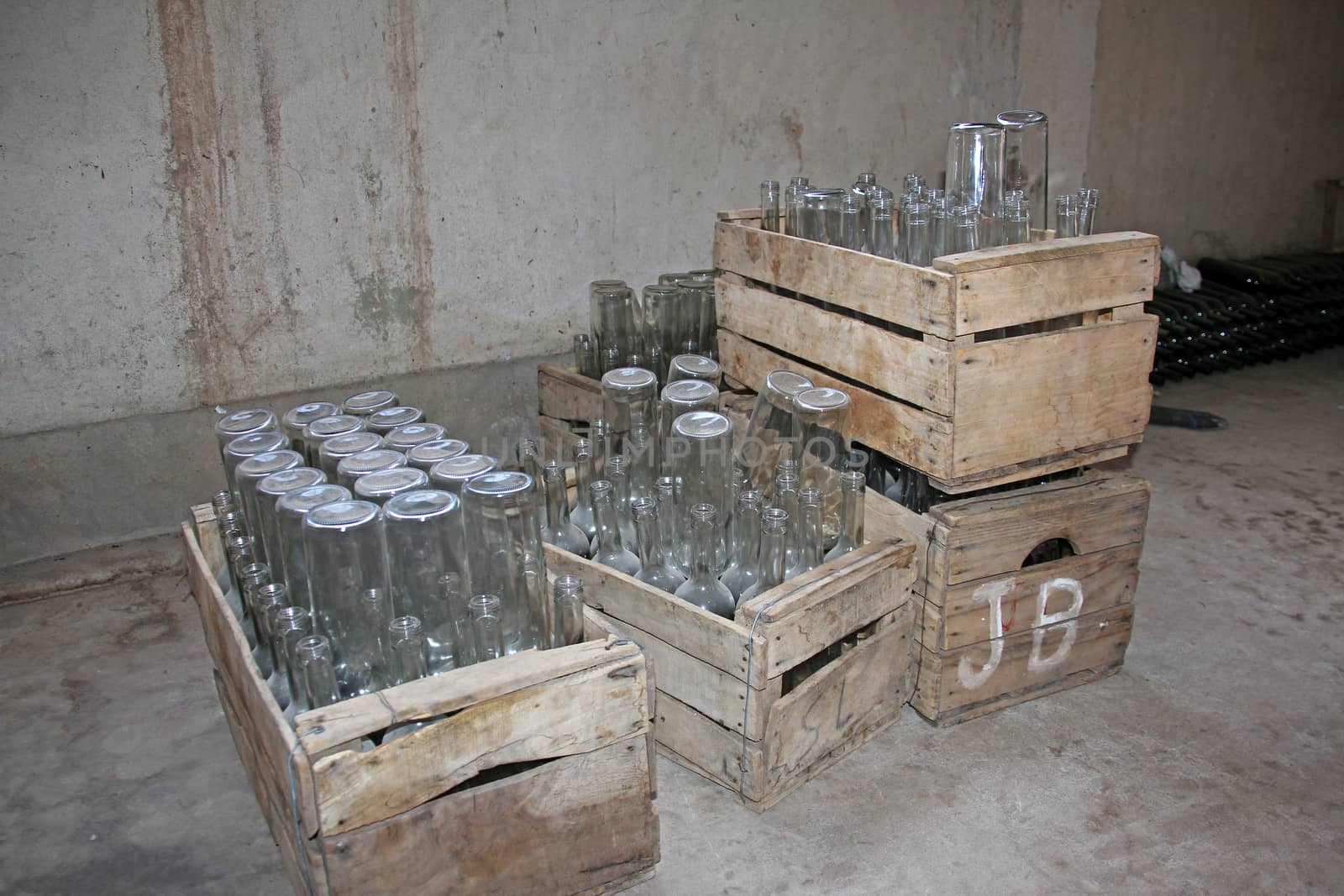 Empty bottles in wooden boxes, ready to be filled, Camargo, Bolivia