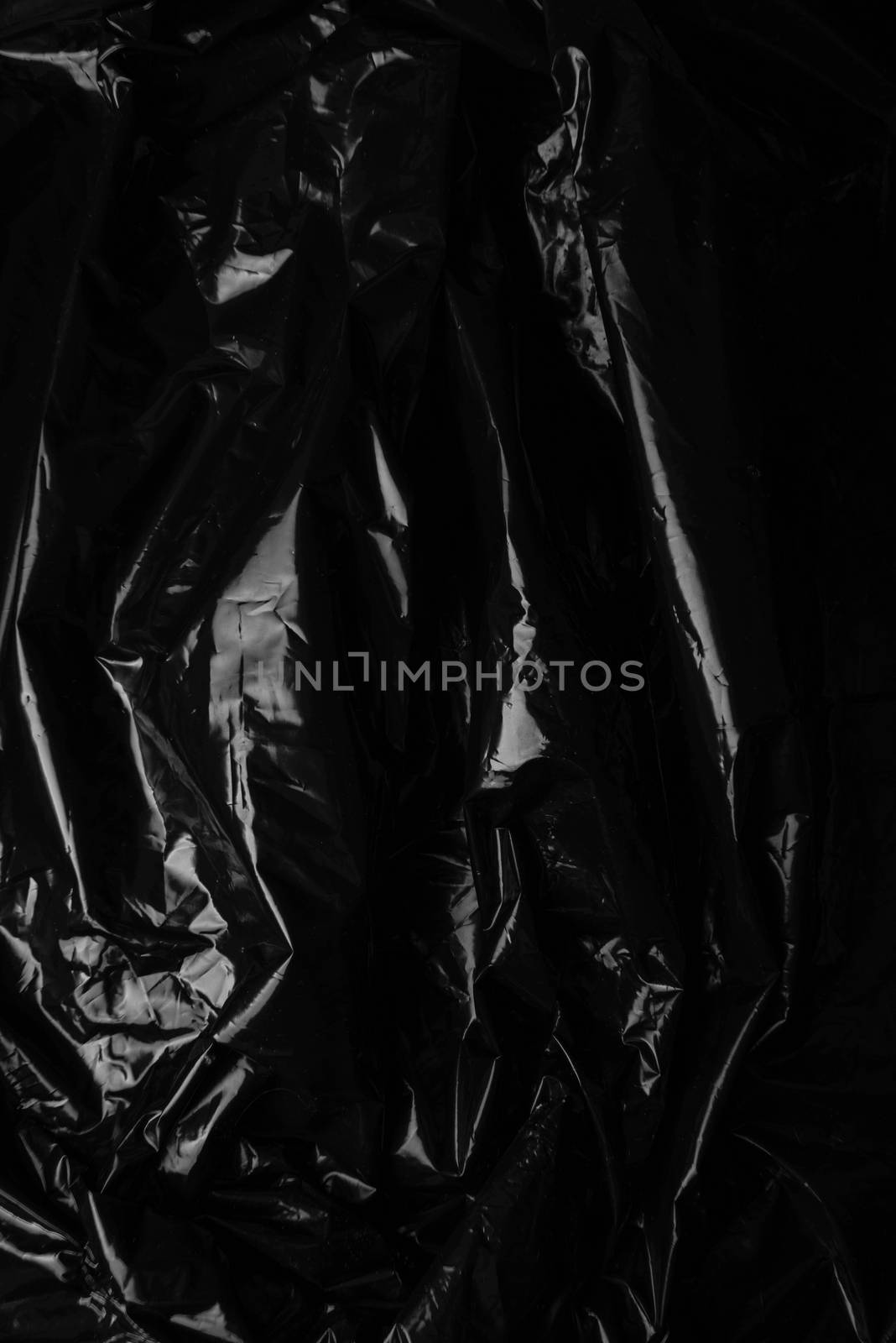 Crumpled plastic film texture . High resolution