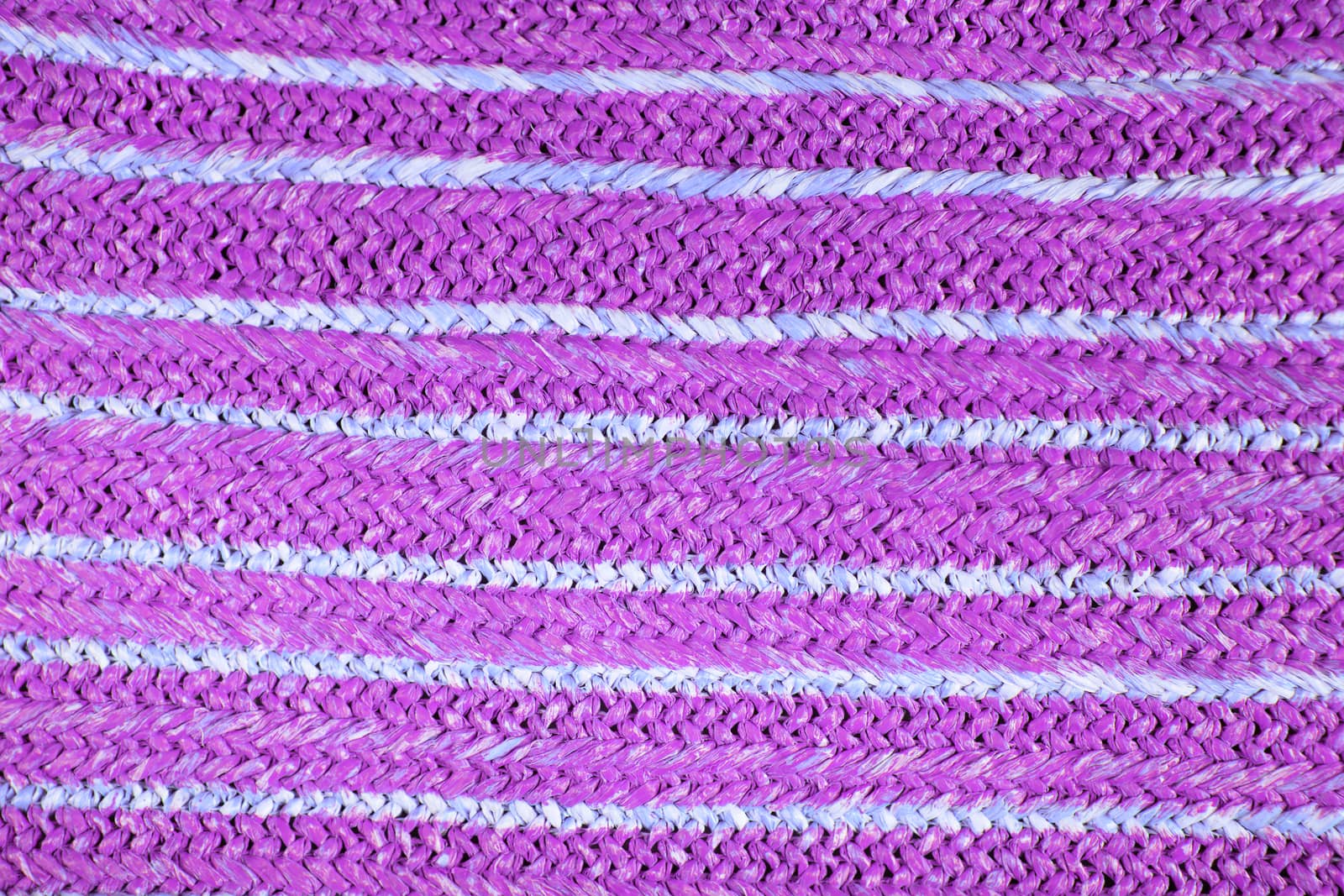 Colored natural straw texture background. Wicker Handbag woven straw. Hemp Pattern from a bag. Weave Pattern Detail, Grunge Texture. Wicker Rough Straw Background Closeup