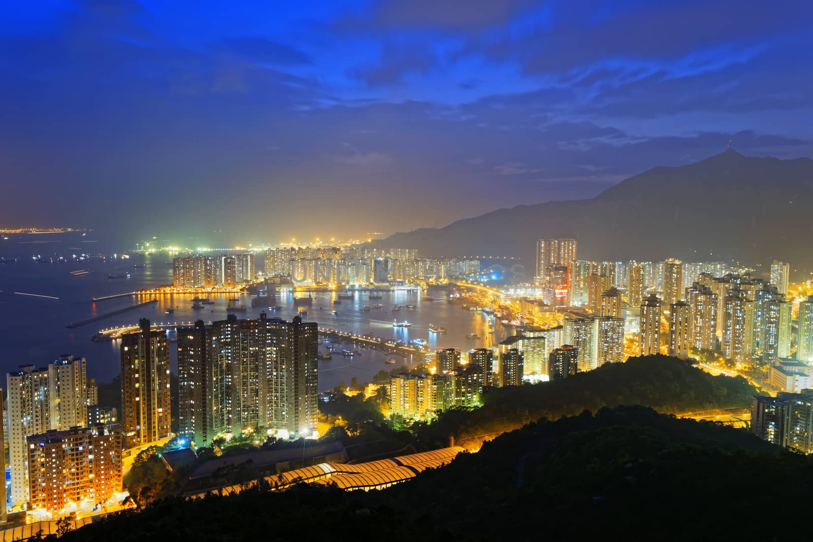 Hong Kong Tuen Mun skyline and South China sea at night