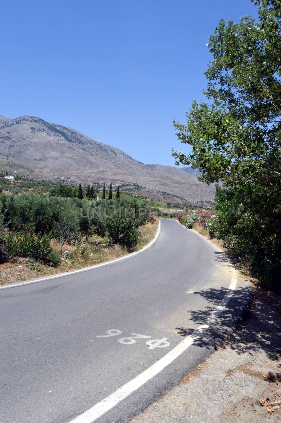 A road calms down in mountains Cretan.