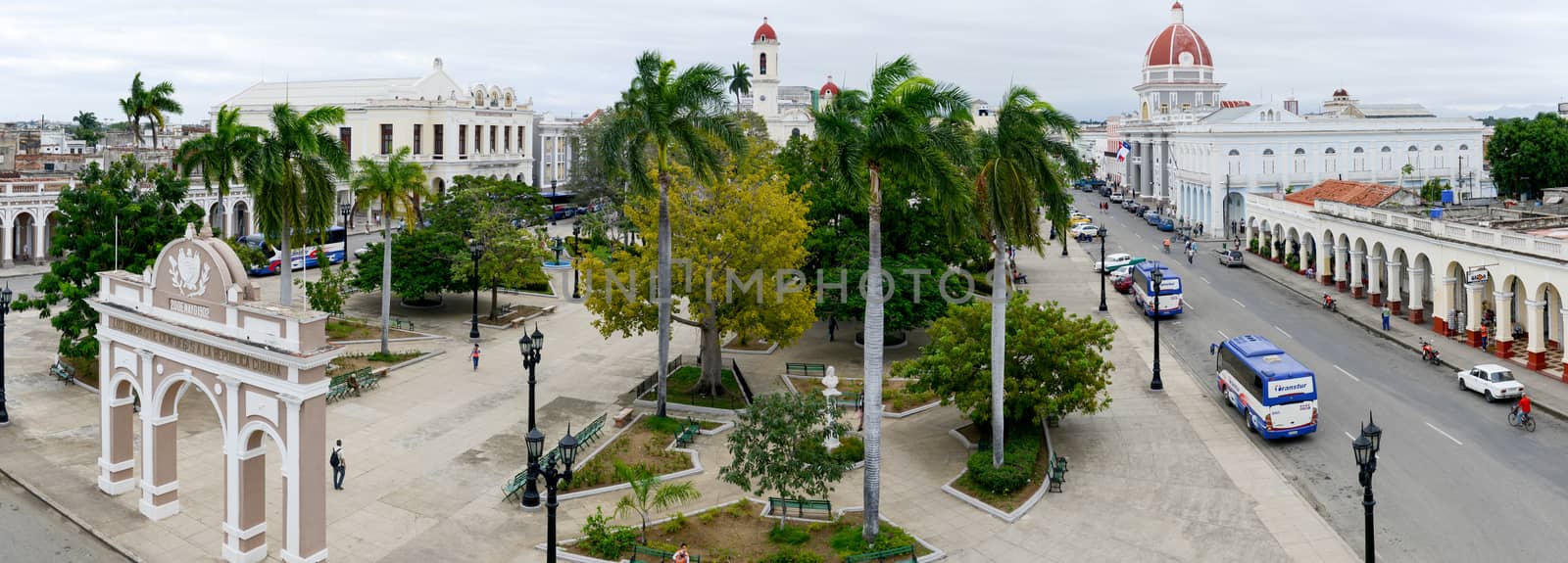 Cienfuegos, Cuba - 18 january 2016: people walking on Jose Marti park with Town Hall and Cathedral of Cienfuegos on Cuba