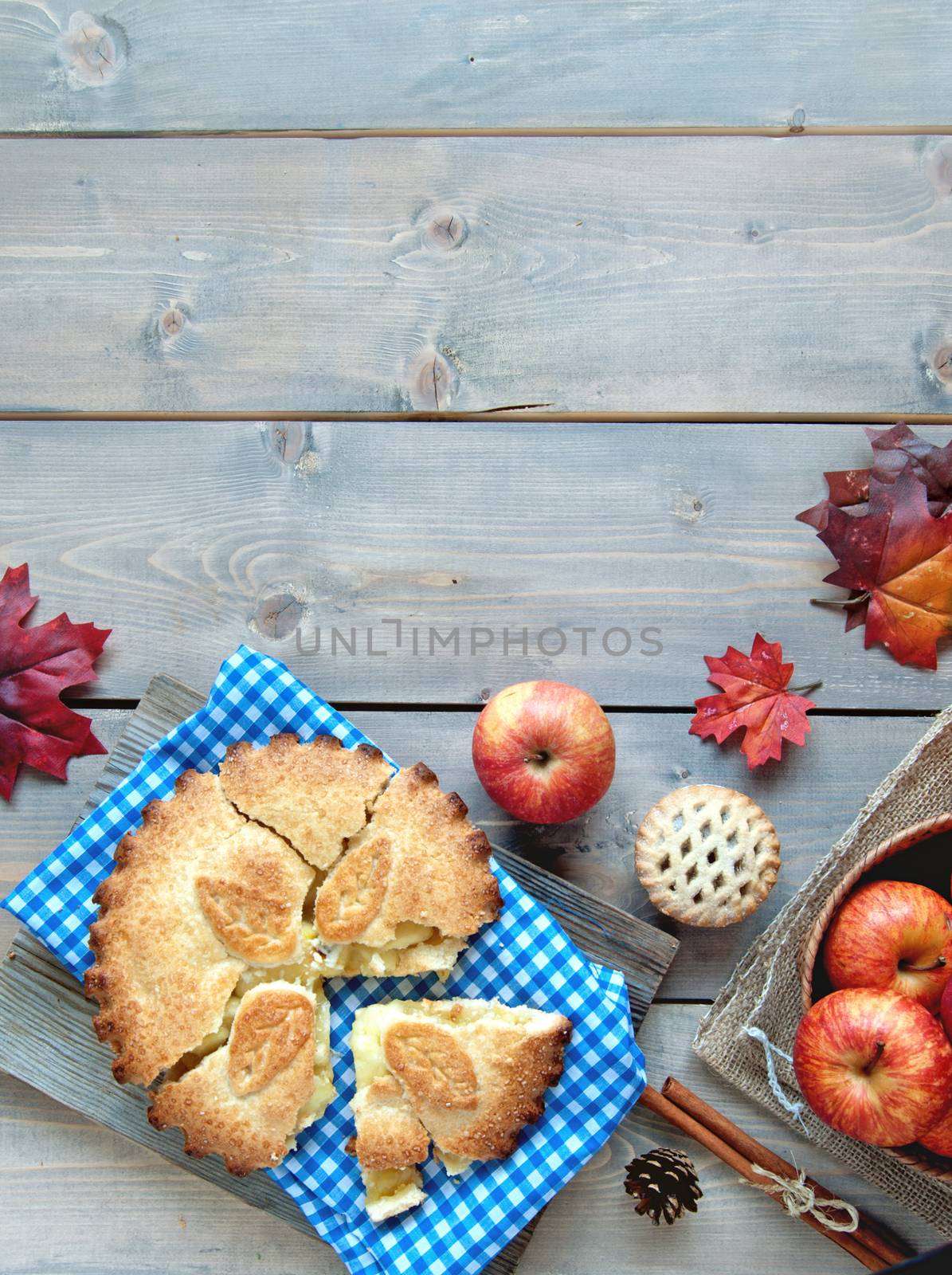 Sliced apple pie with fruit ingredients and space 