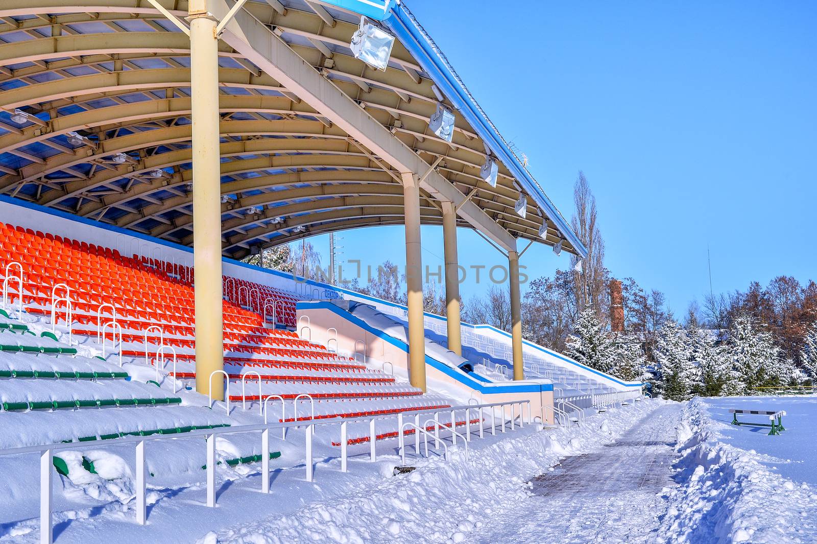Background chairs at stadium , winter