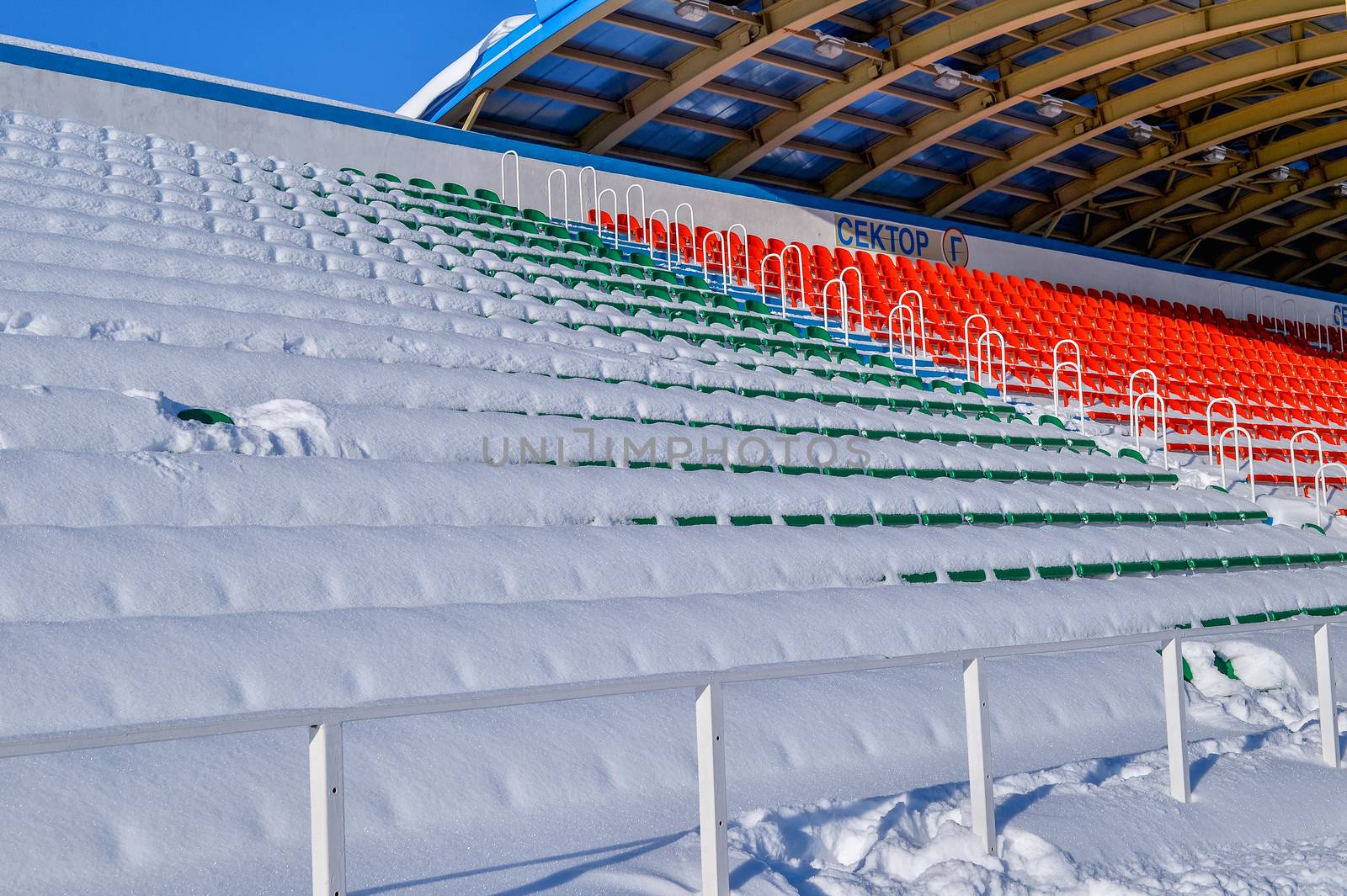 Background chairs at stadium , winter