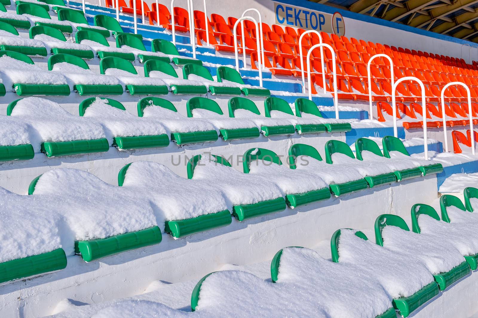 Background chairs at stadium , winter