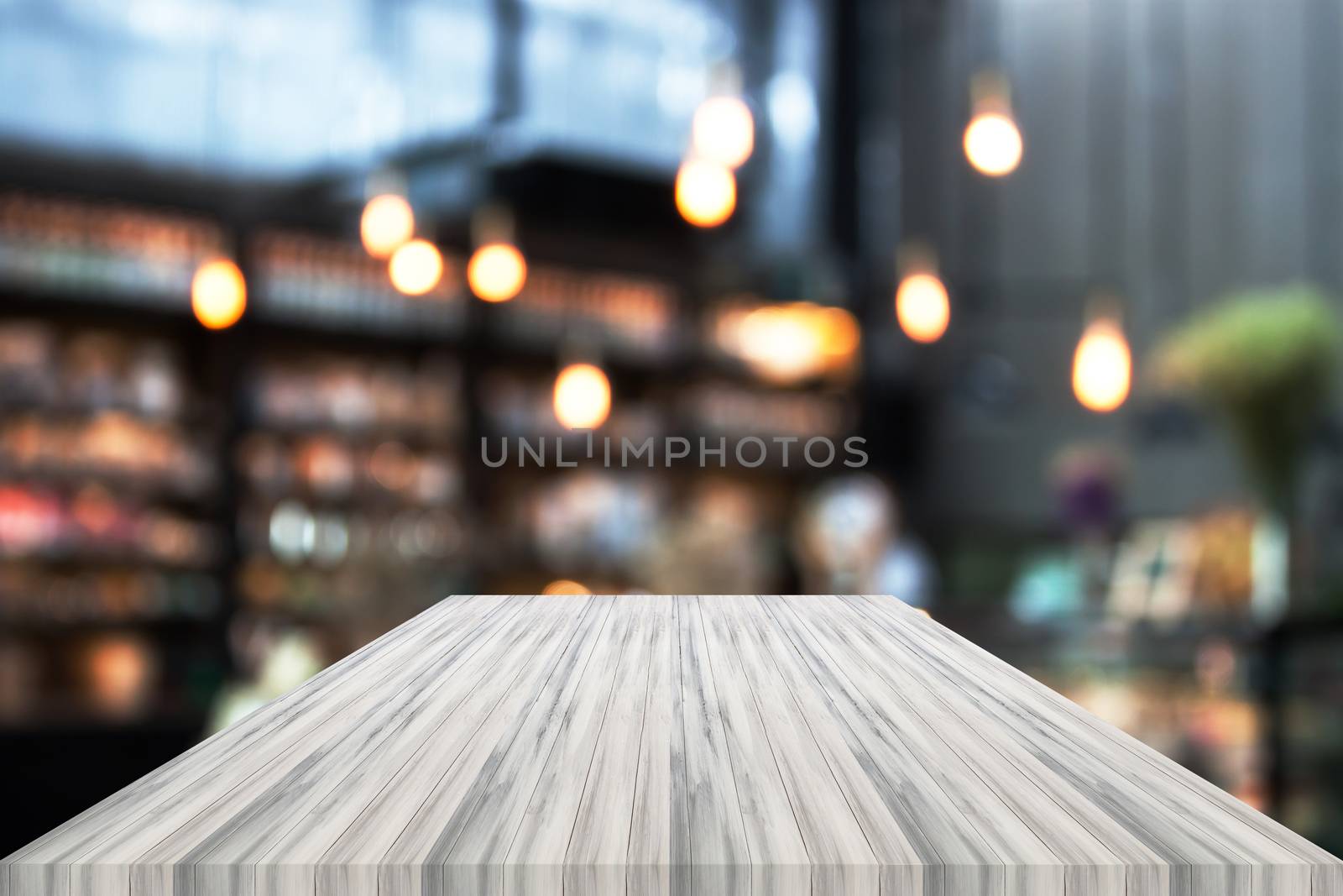 Perspective white luxury wooden with blurred cafe background by punsayaporn