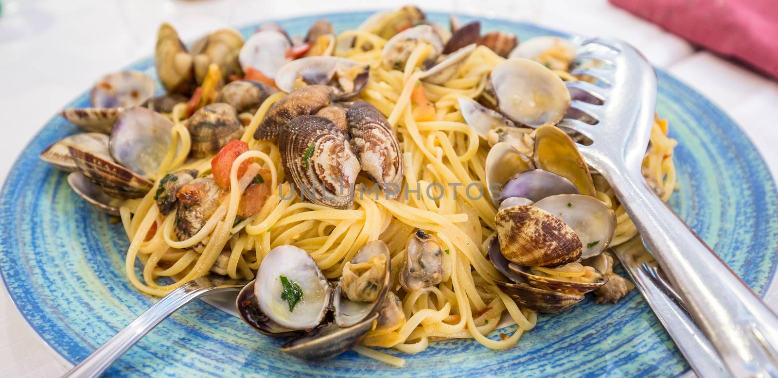 Restaurant in Naples, Italy. No photography set for this just arrived on the table Spaghetti alle vongole