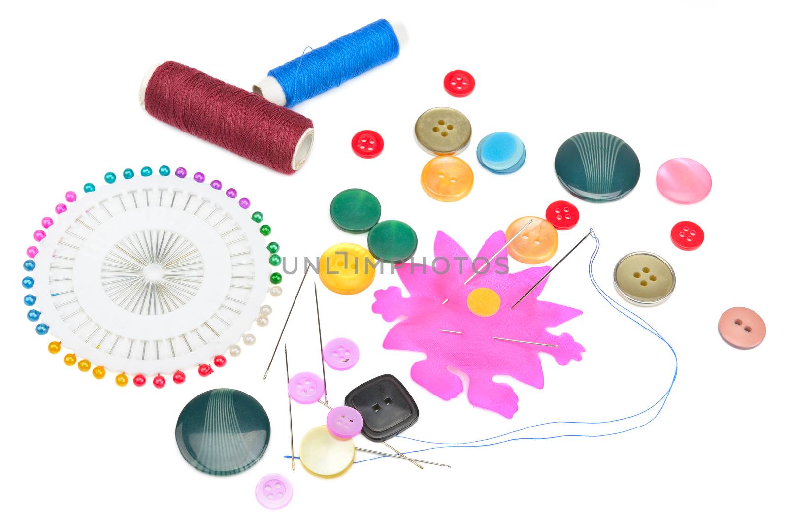 set of buttons and sewing supplies isolated on white background