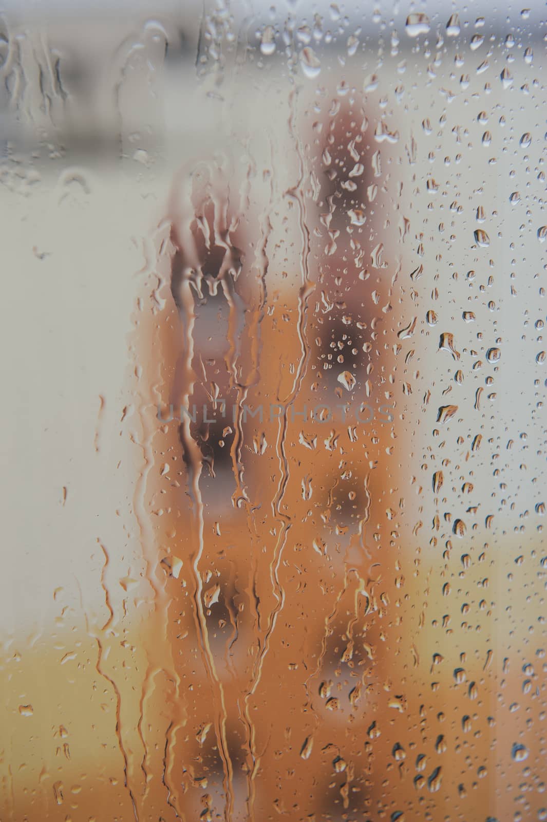 Drops of rain on the window. Rainy weather