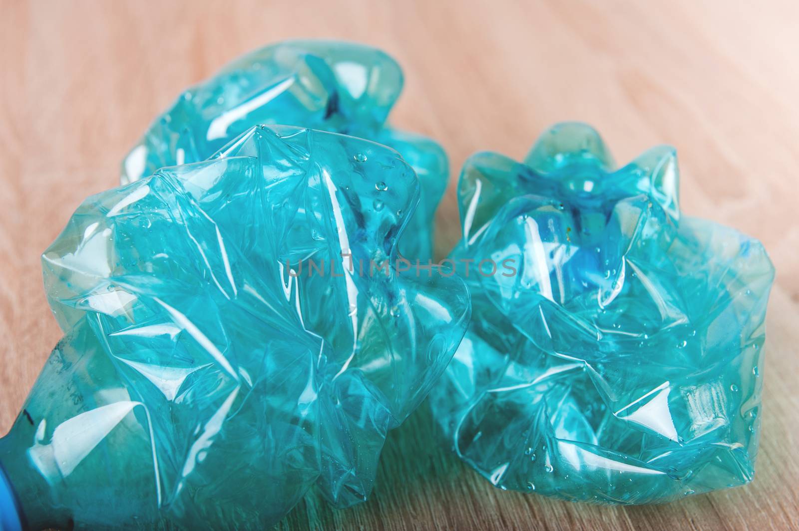 set of blue empty plastic water bottles