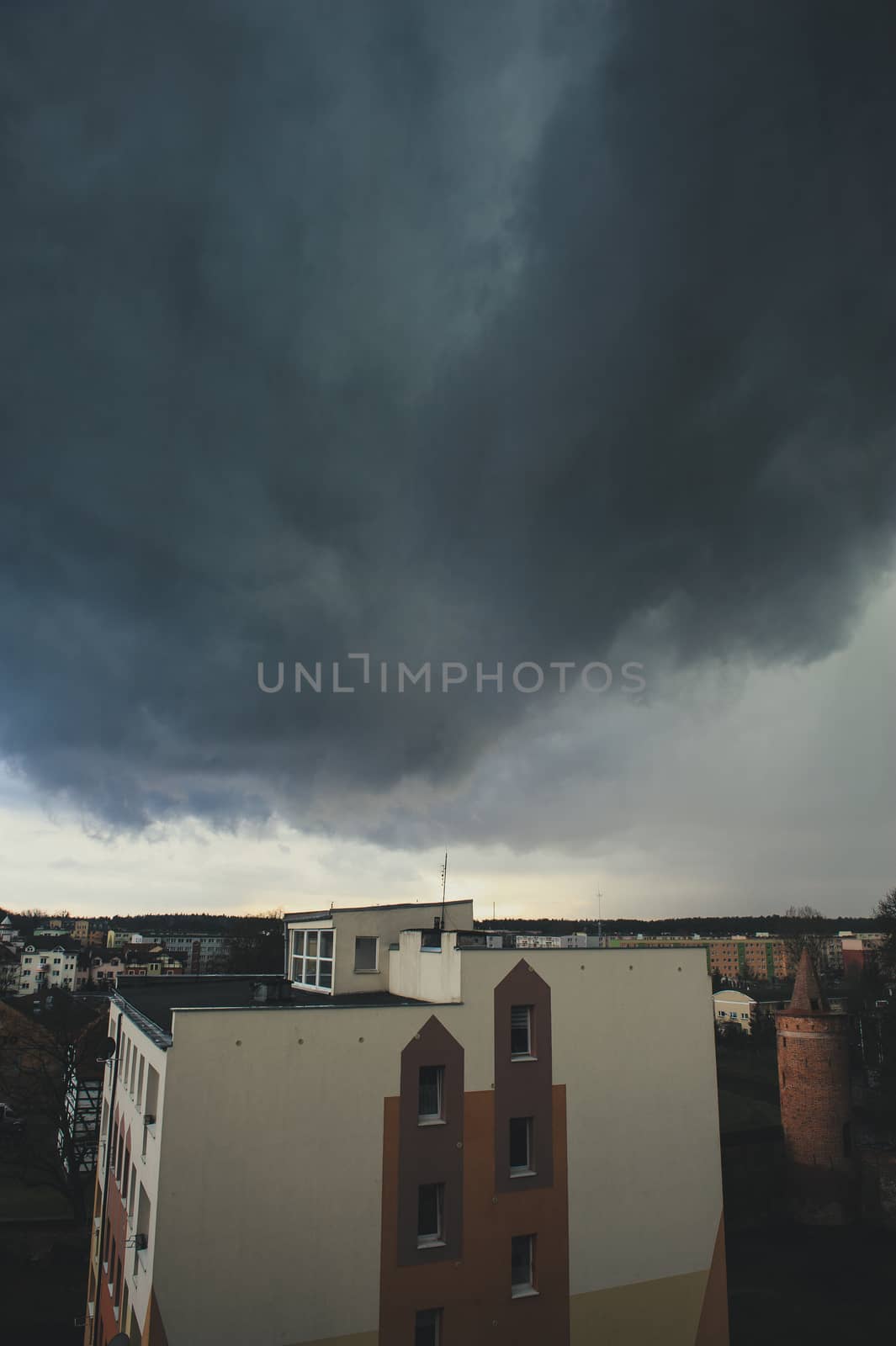 Dramatic dark storm clouds over the city