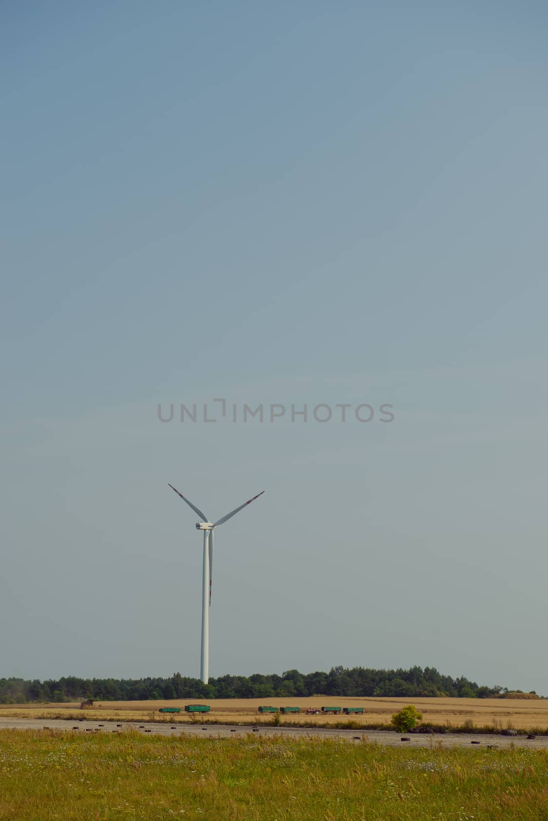 wind trubine at sunny day with blue sky