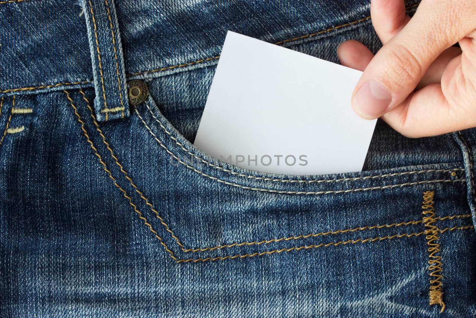 Piece of paper in blue jeans pocket