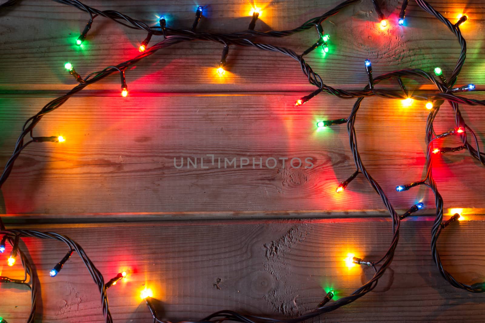 Christmas tree garland on wooden table by liwei12