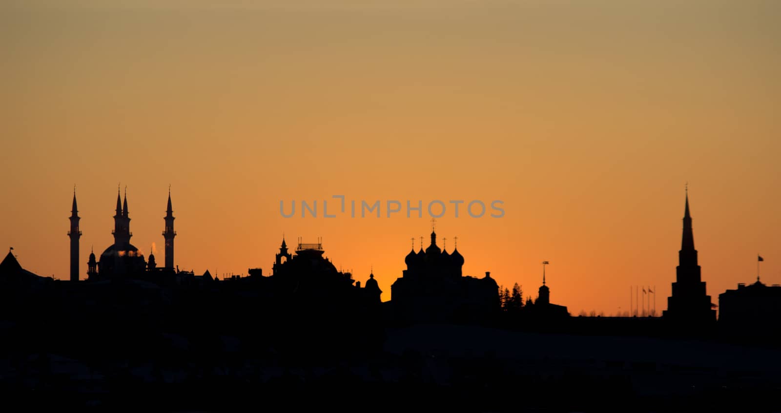 golden and orange winter sunset, kazan kremlin silhouette  