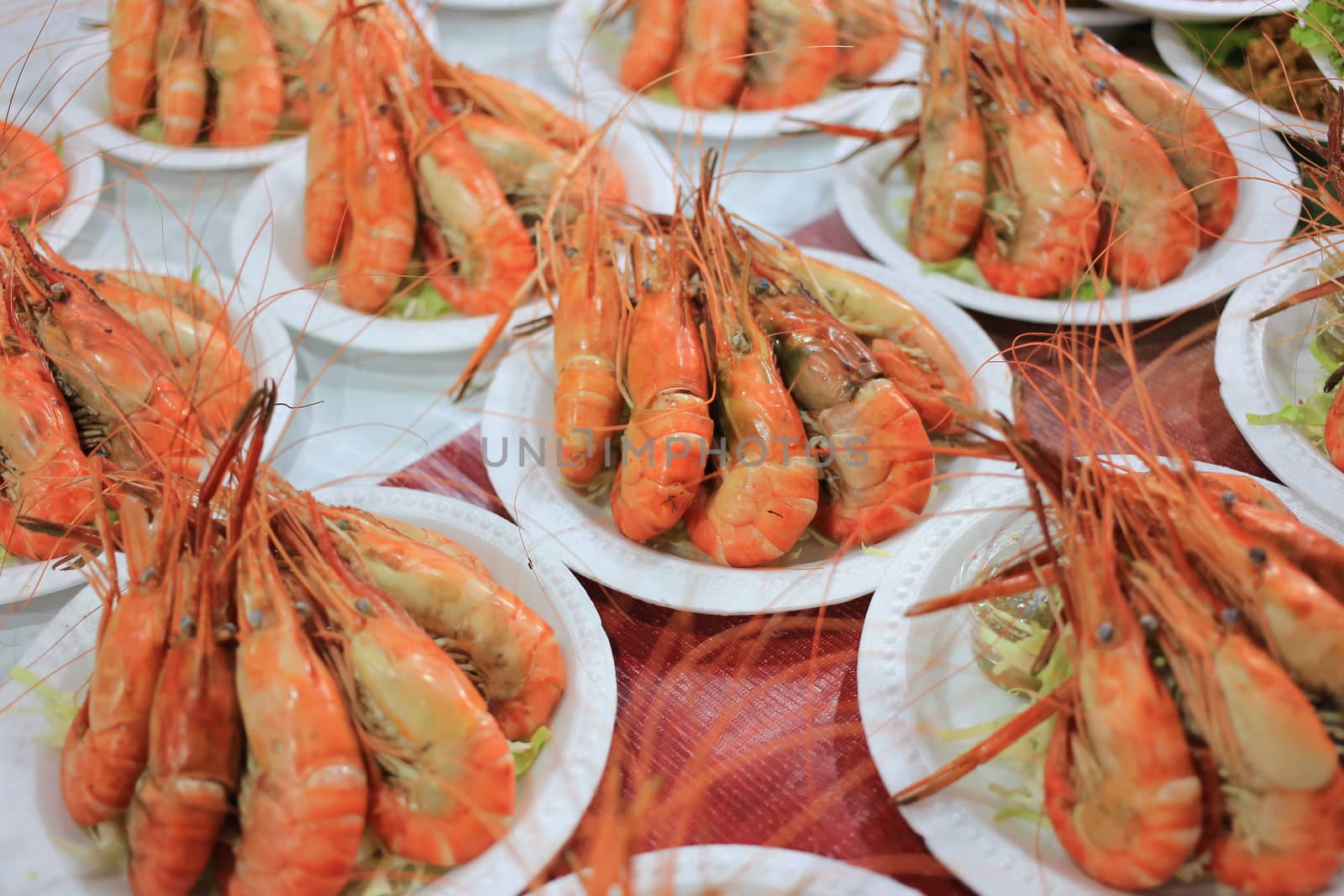 fried shrimp on foam dish for sell at night market