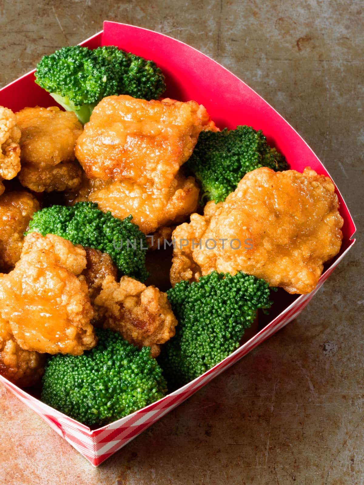 close up of rustic american chinese takeout general tso chicken