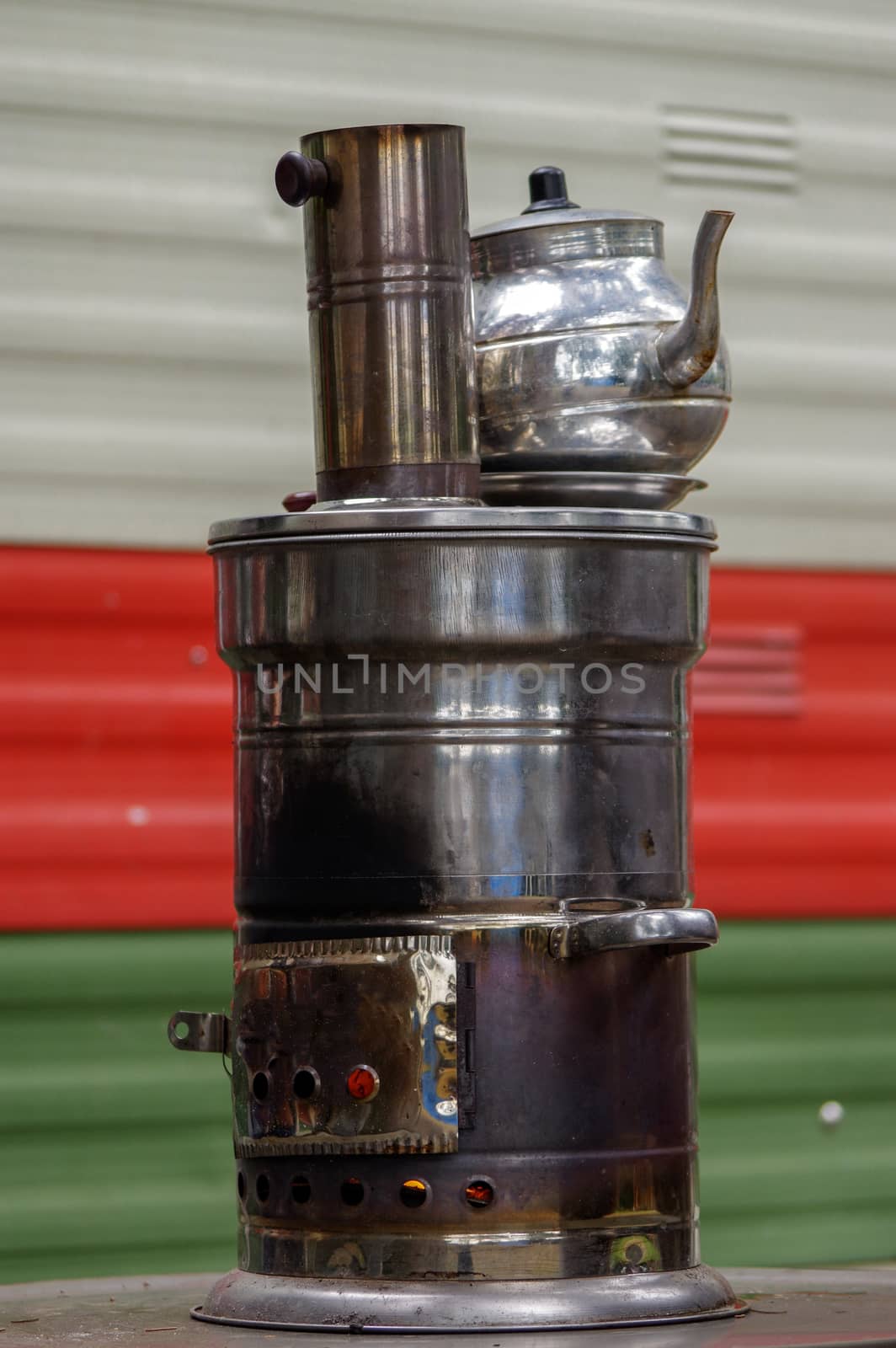 Ancient Russian samovar with open fire. A device for making tea. by evolutionnow