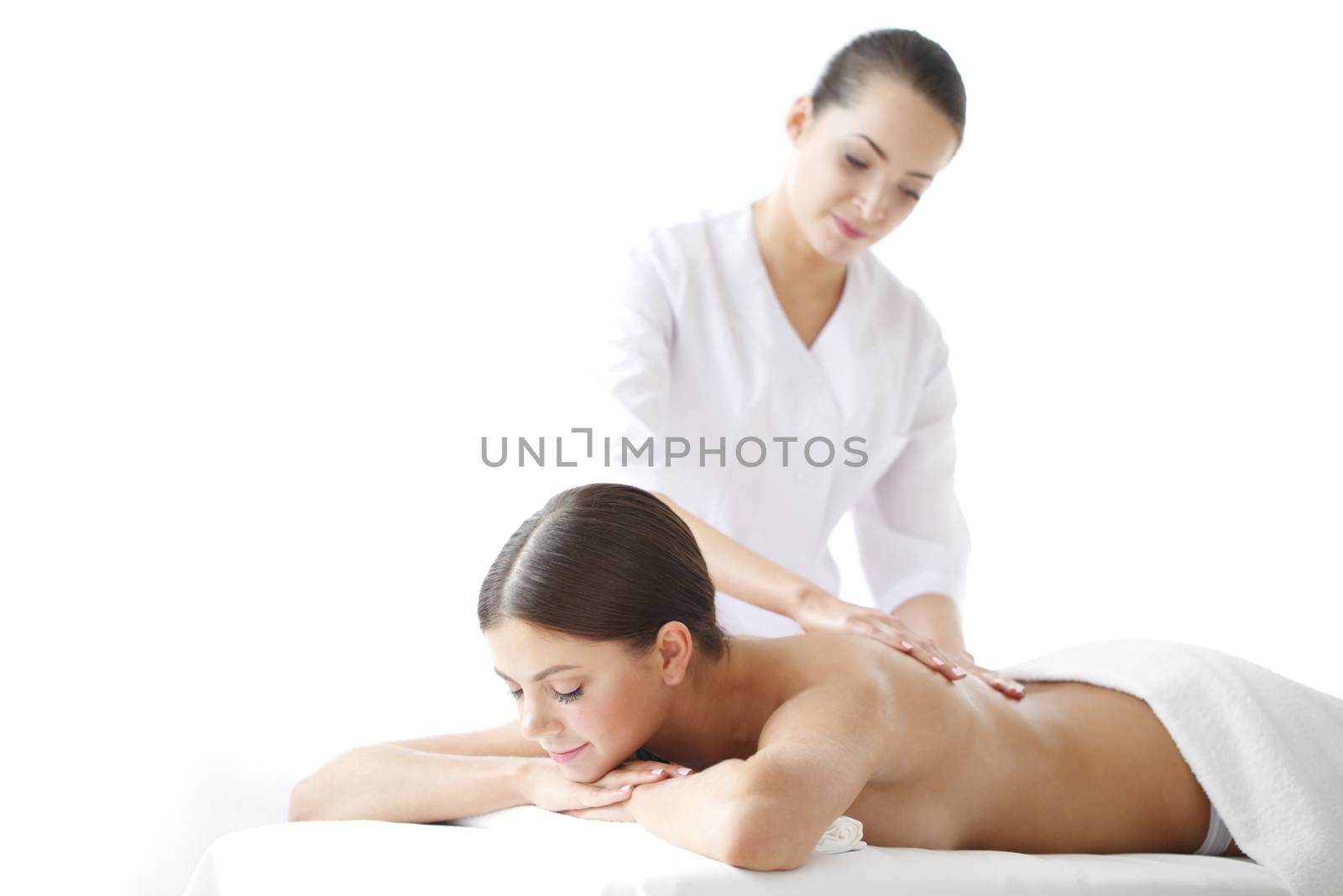 Woman getting massage by ALotOfPeople