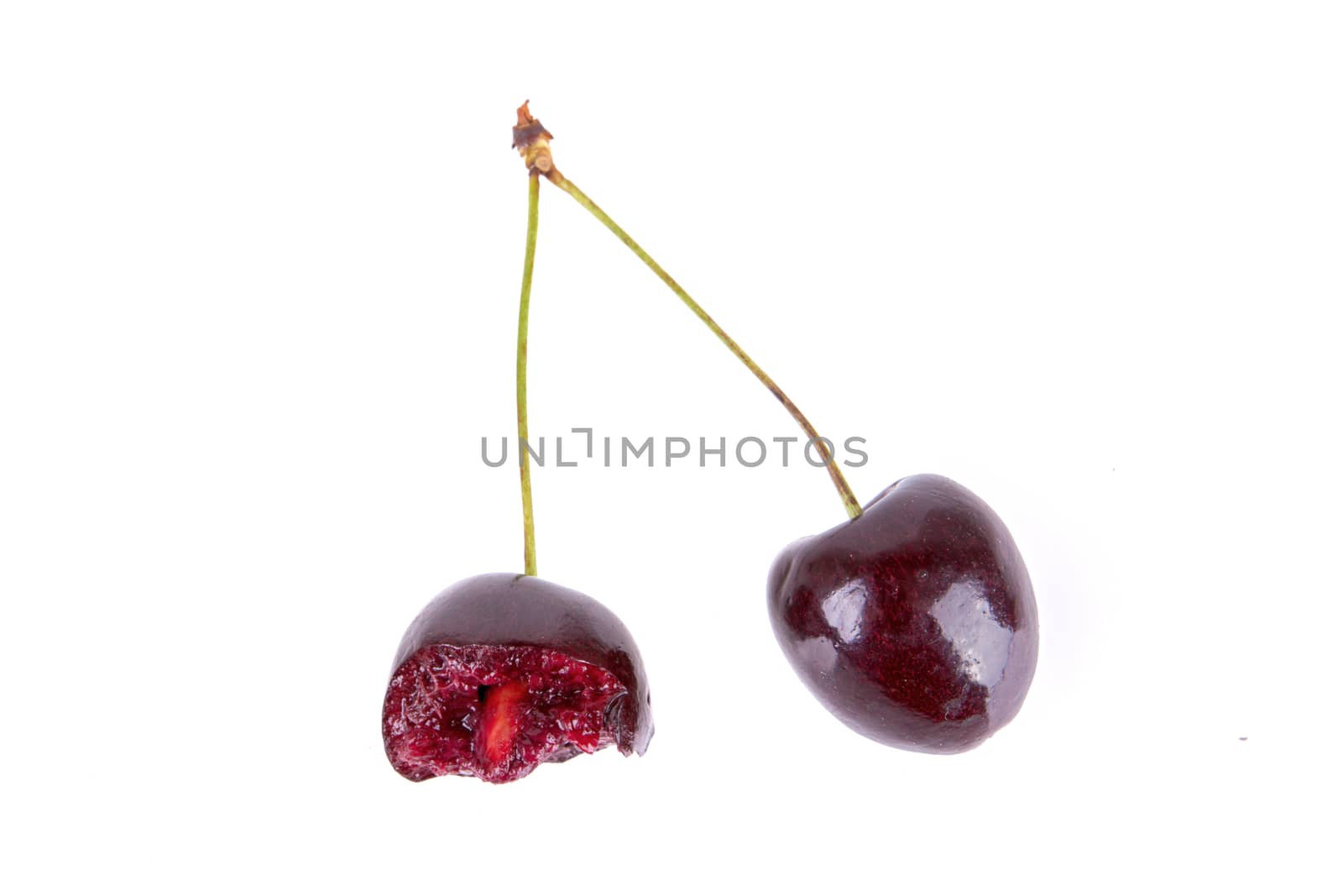 Dark red cherry isolated on a white background