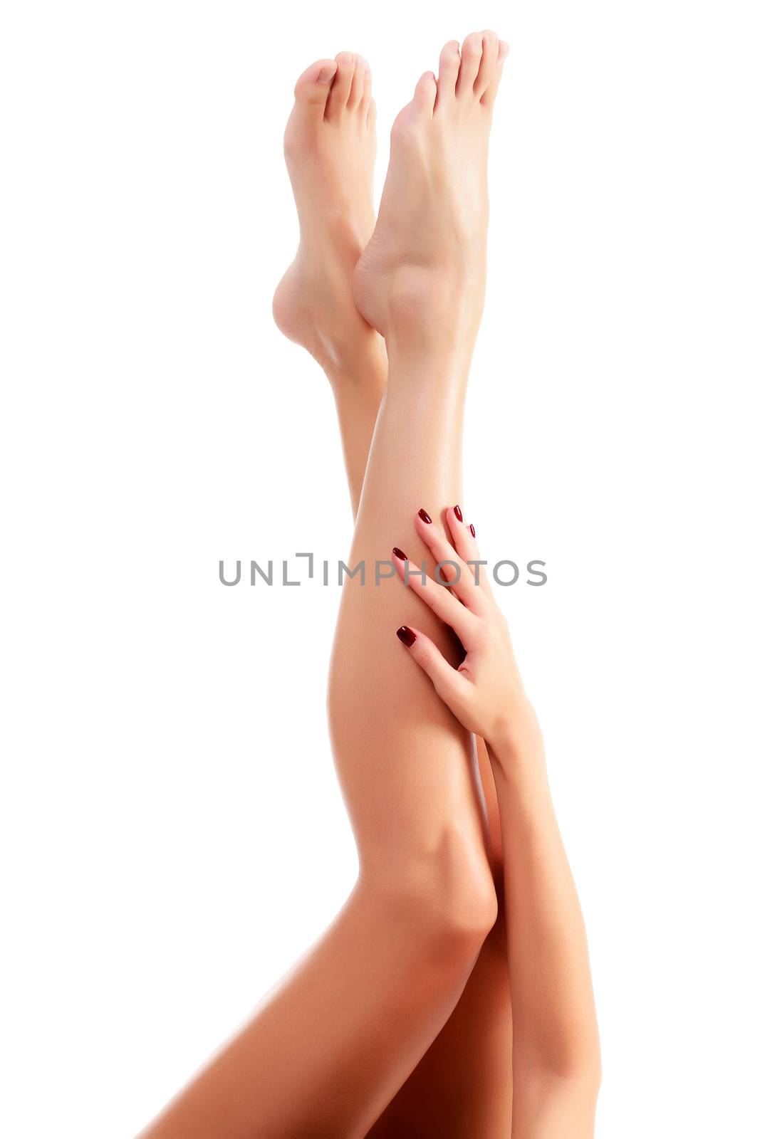 Woman legs and hand, isolated on white background