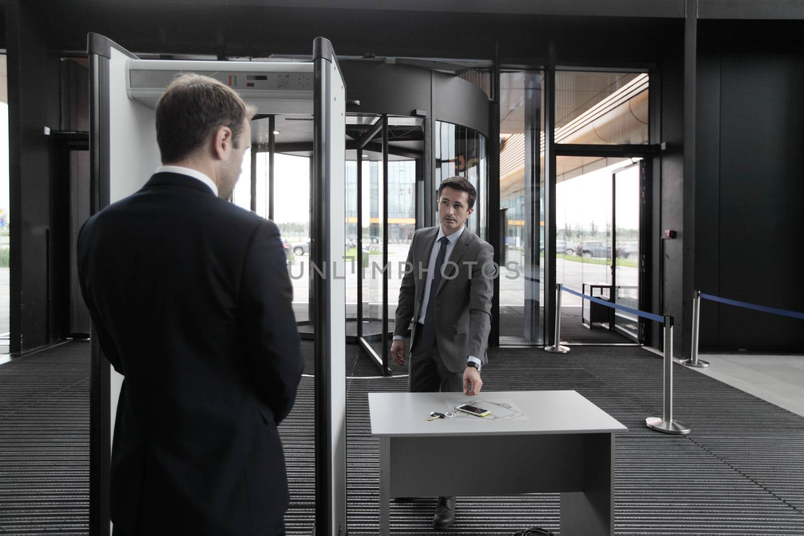 Man at airport security gates by ALotOfPeople