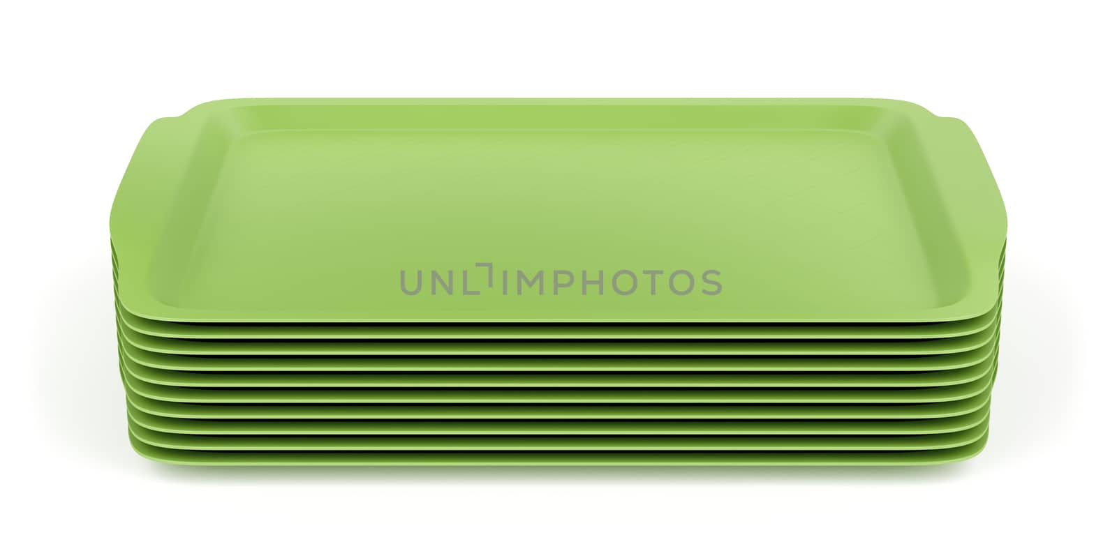 Group of green plastic trays on white background