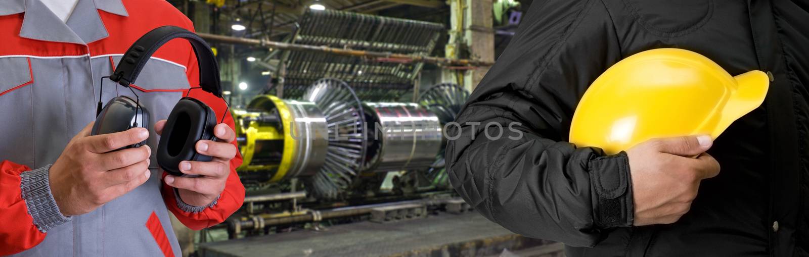 Workers with safety uniform at industrial factory