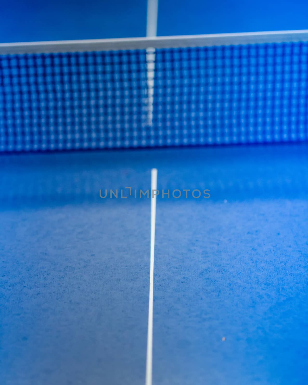 Net on blue ping pong tennis table